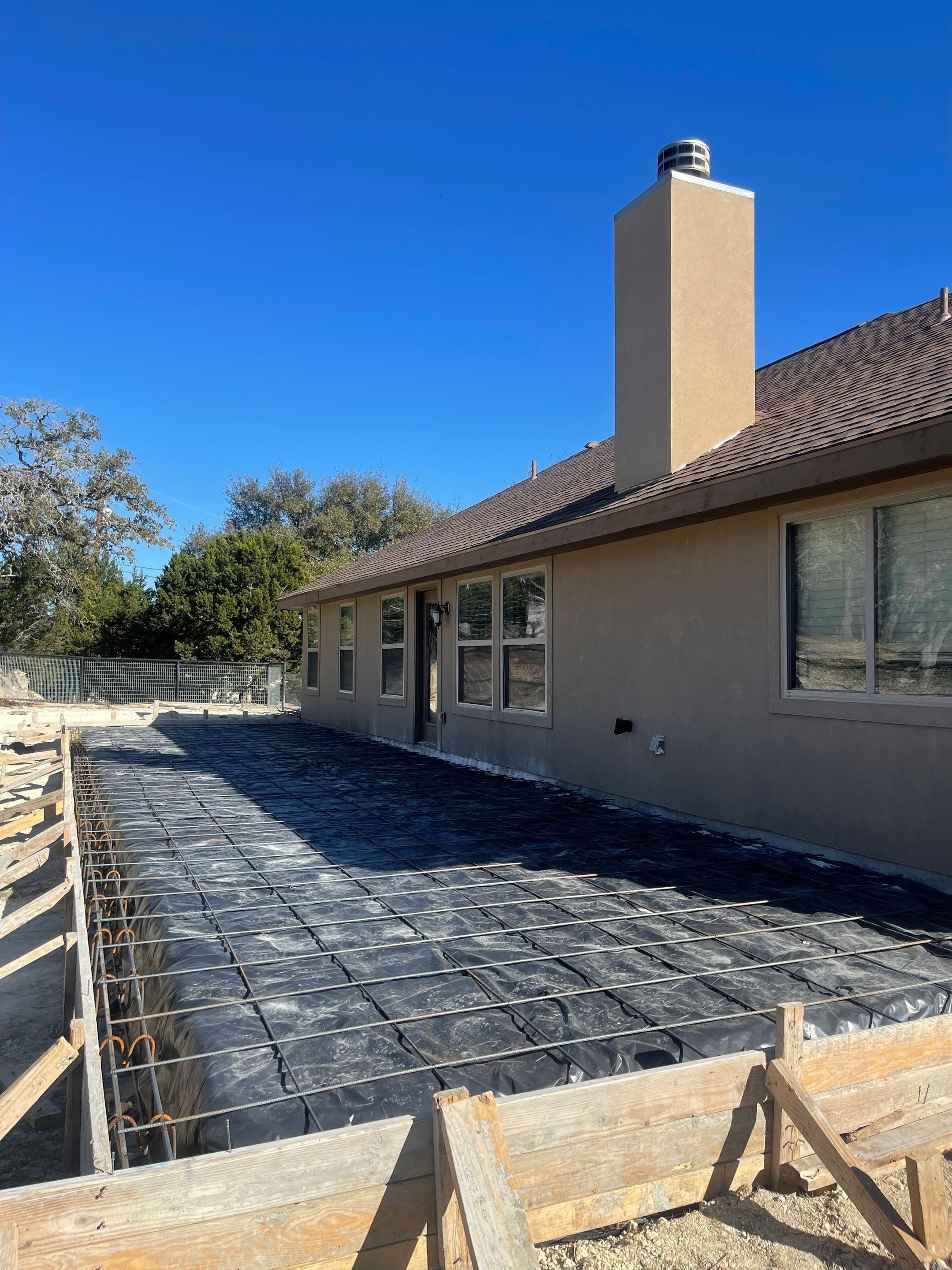 Reroof with Back Patio Addition using Owens Corning Duration Aged Copper by Lightning Exteriors