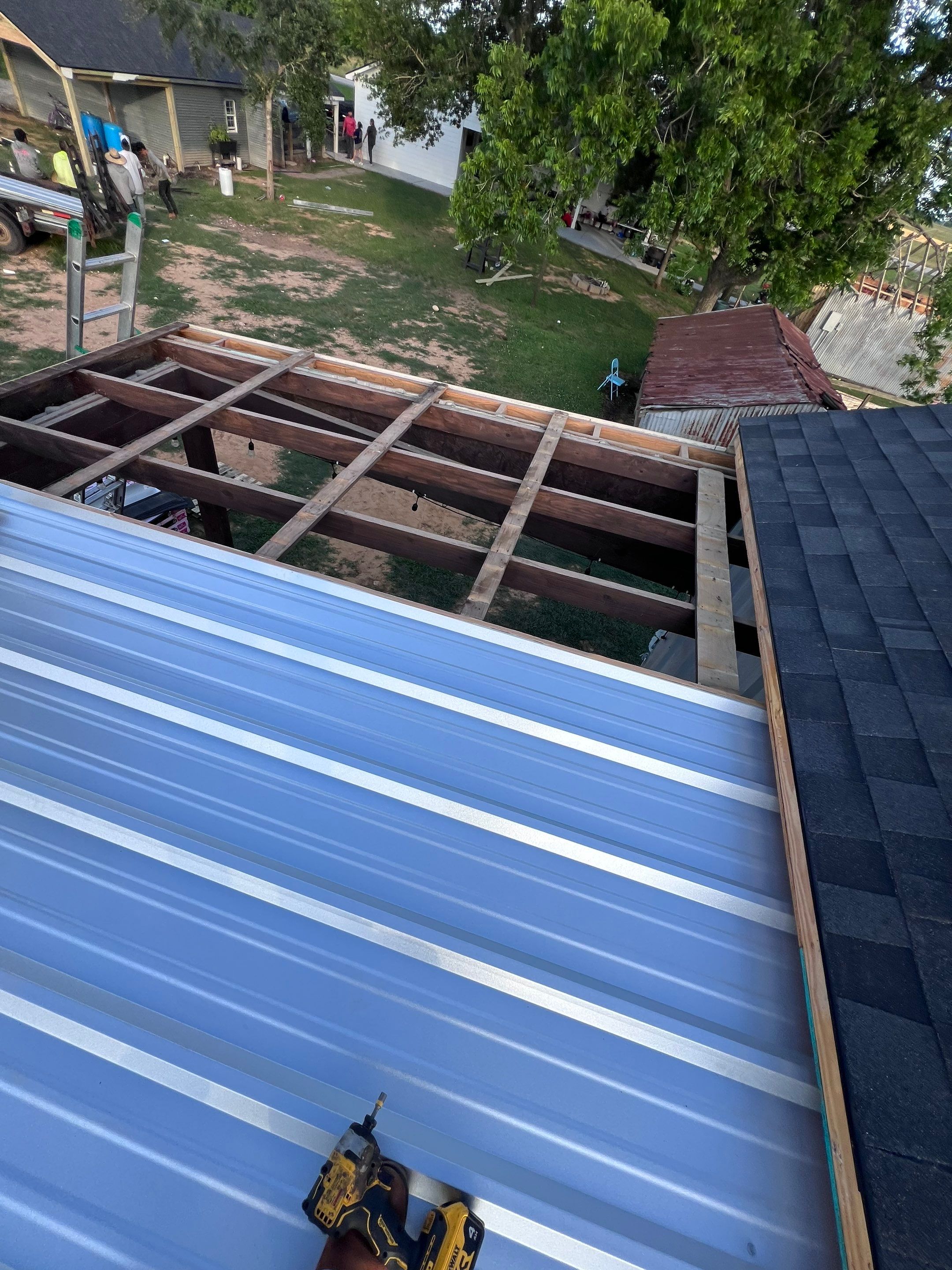 Residential Roofing Installation using Metal by Roof Repair Company