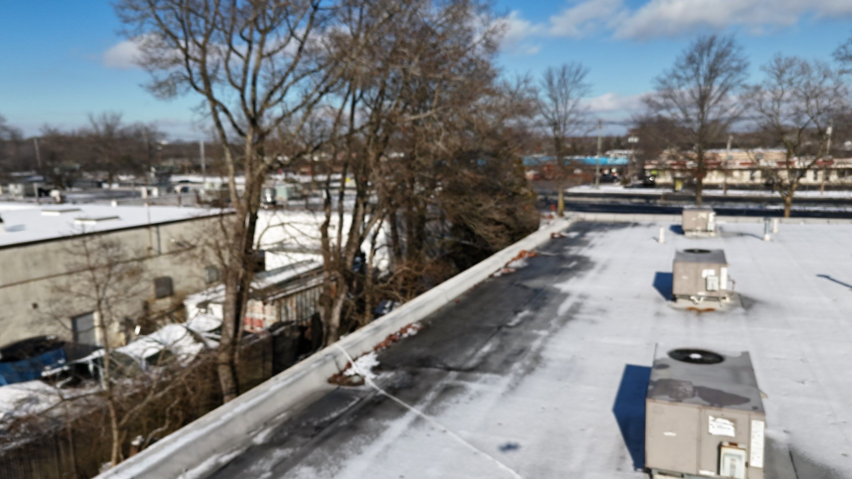 Bohemia Flat Roof Cleanup  by Above All Gutters 