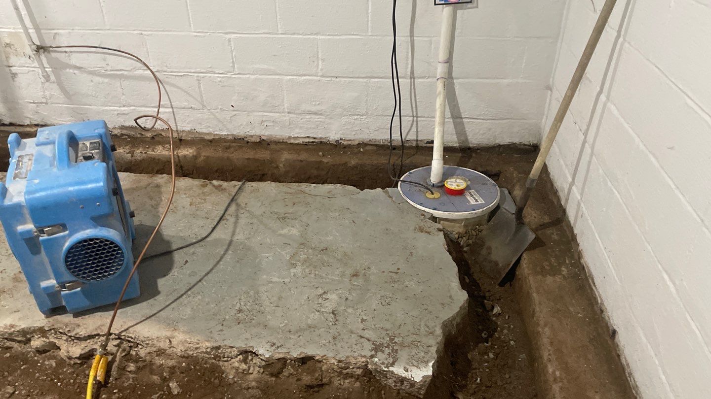 Interior Drain Tile & Yard French Drain in St. Paul, MN by Waterproofing Northeast