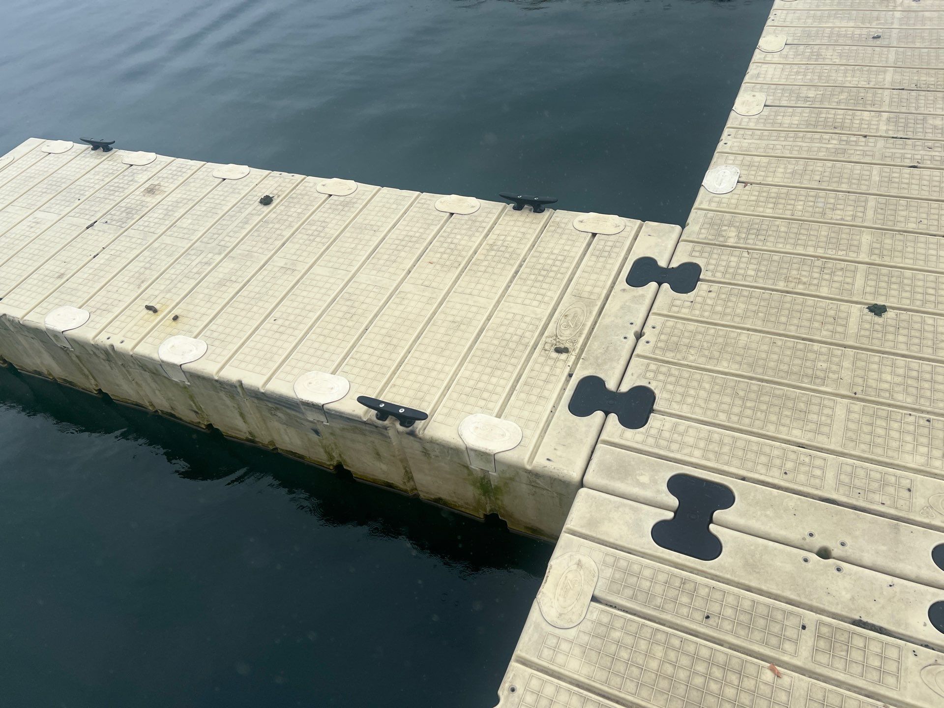 Power washing of floating dock by Northern Power Washing LLC.