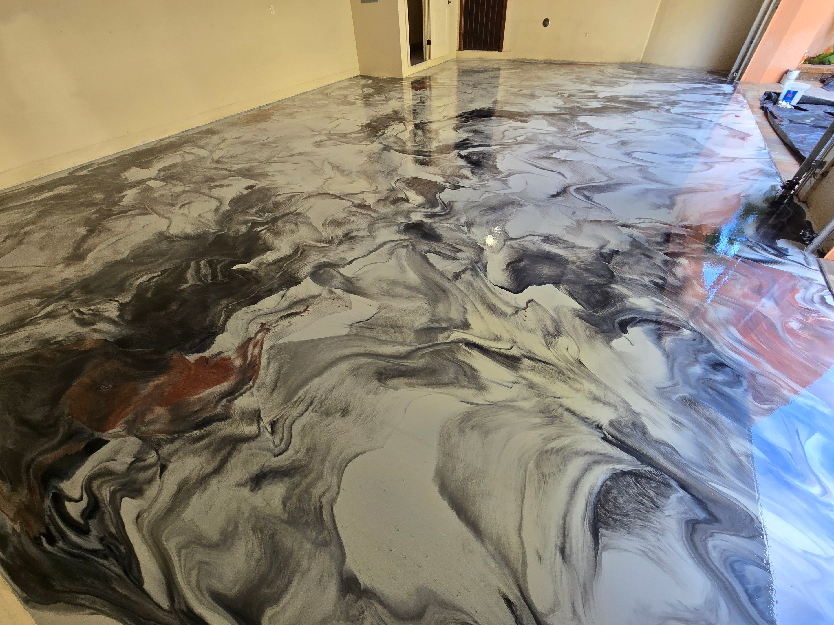 High-Gloss Black & White Metallic Marble Finish by Performance Floors & Coating
