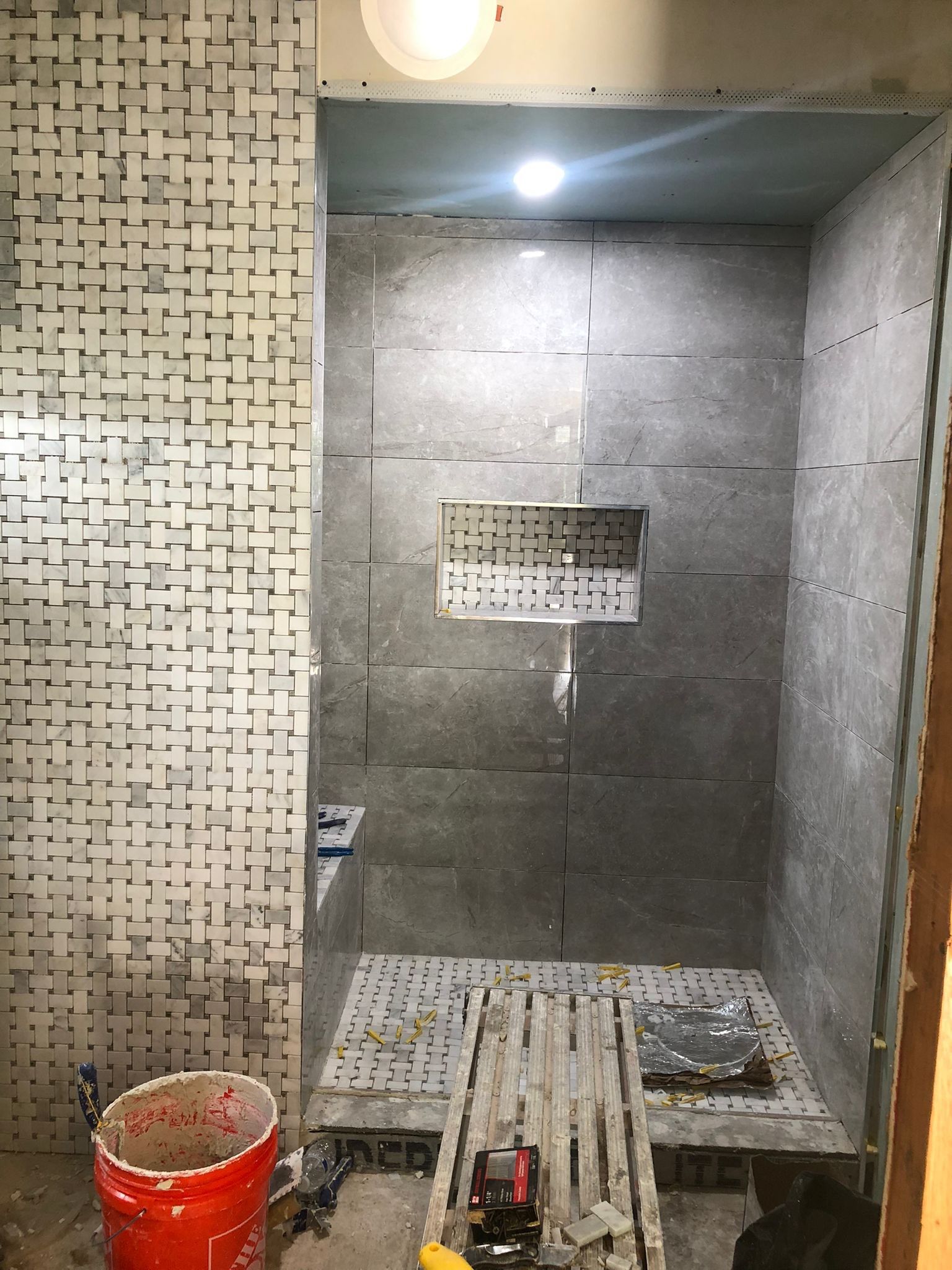 Bathroom Remodel using Tile by Home Concepts Construction
