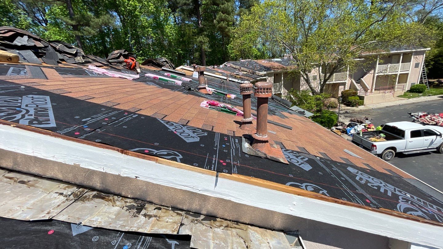 Commercial Roofing Installation using Owens Corning Autumn Brown by Inspector Roofing and Restoration