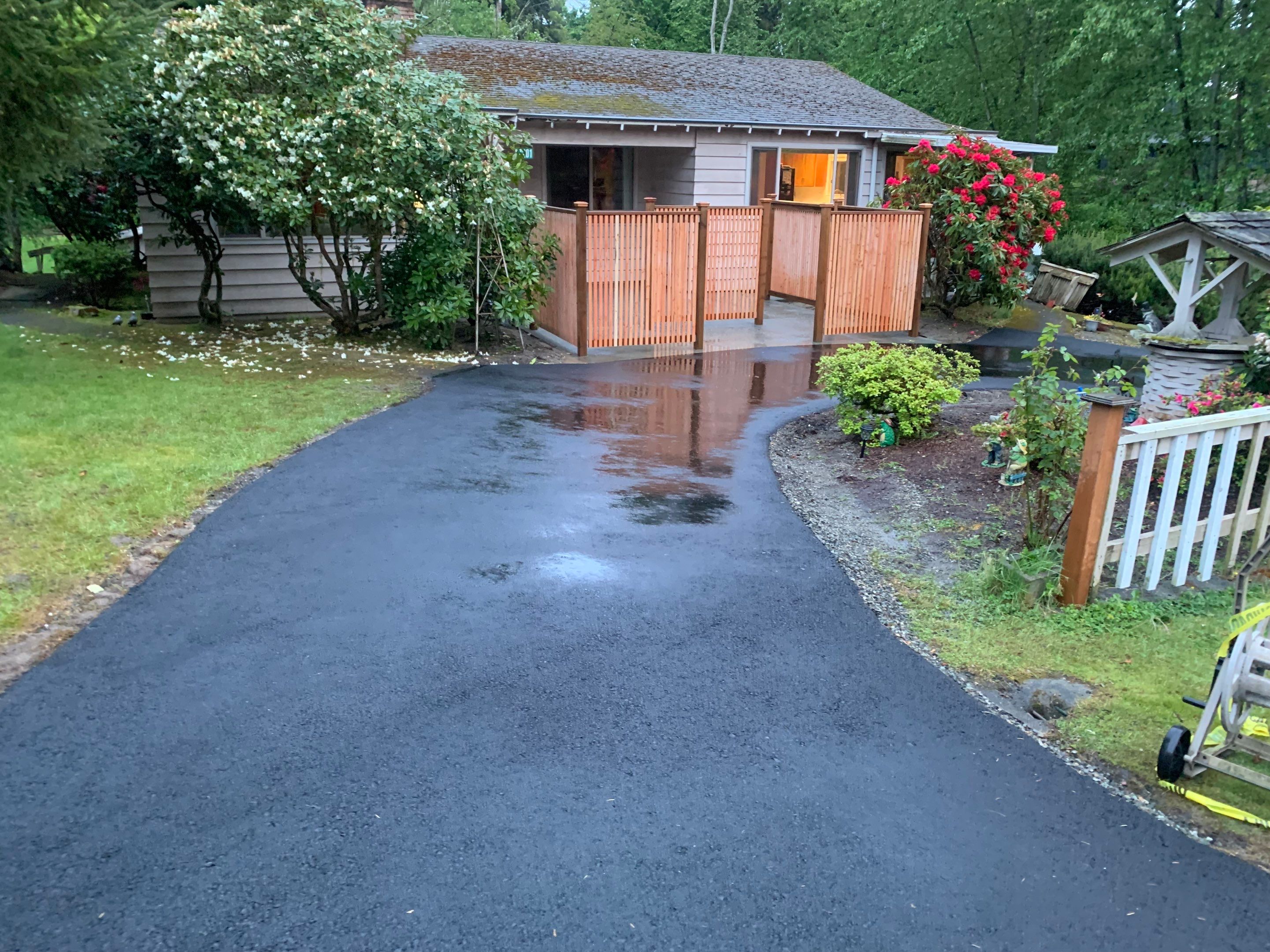 Modern Entry Fence by Jireh Asphalt & Concrete Inc 