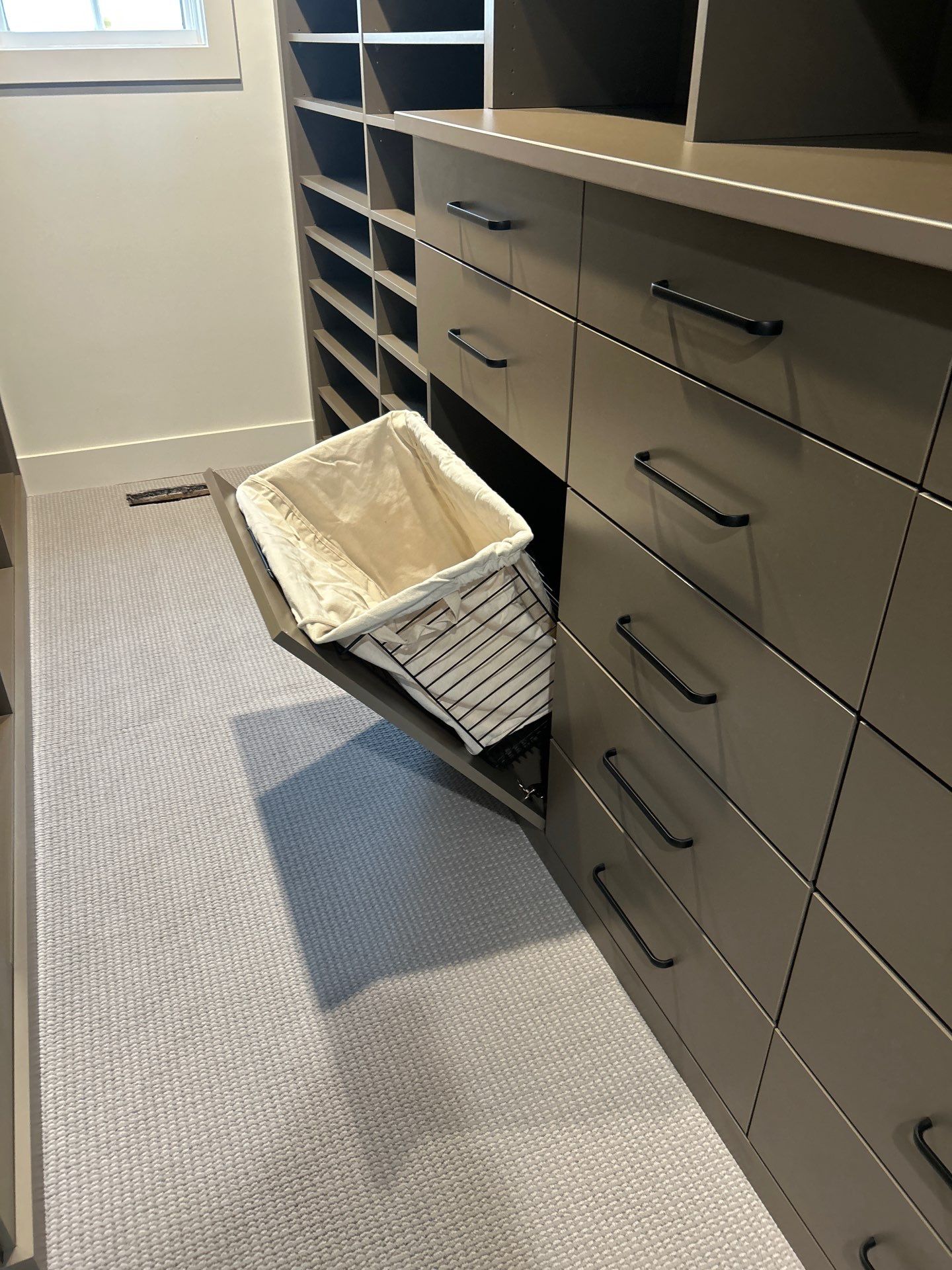 Enjoy a Morning Latte in this Walk-in Closet by Concept 32, Inc.