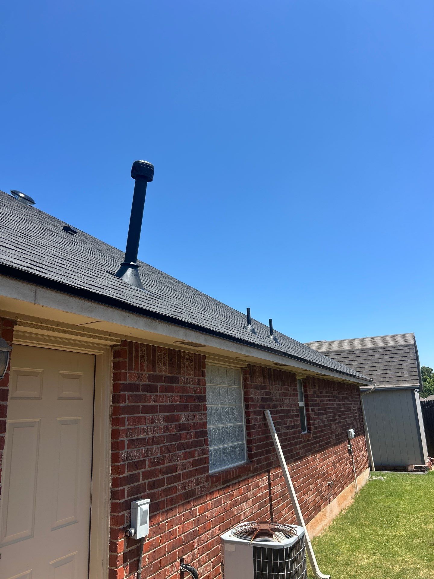 roof replacement in Mustang by McCann's Roofing and Construction