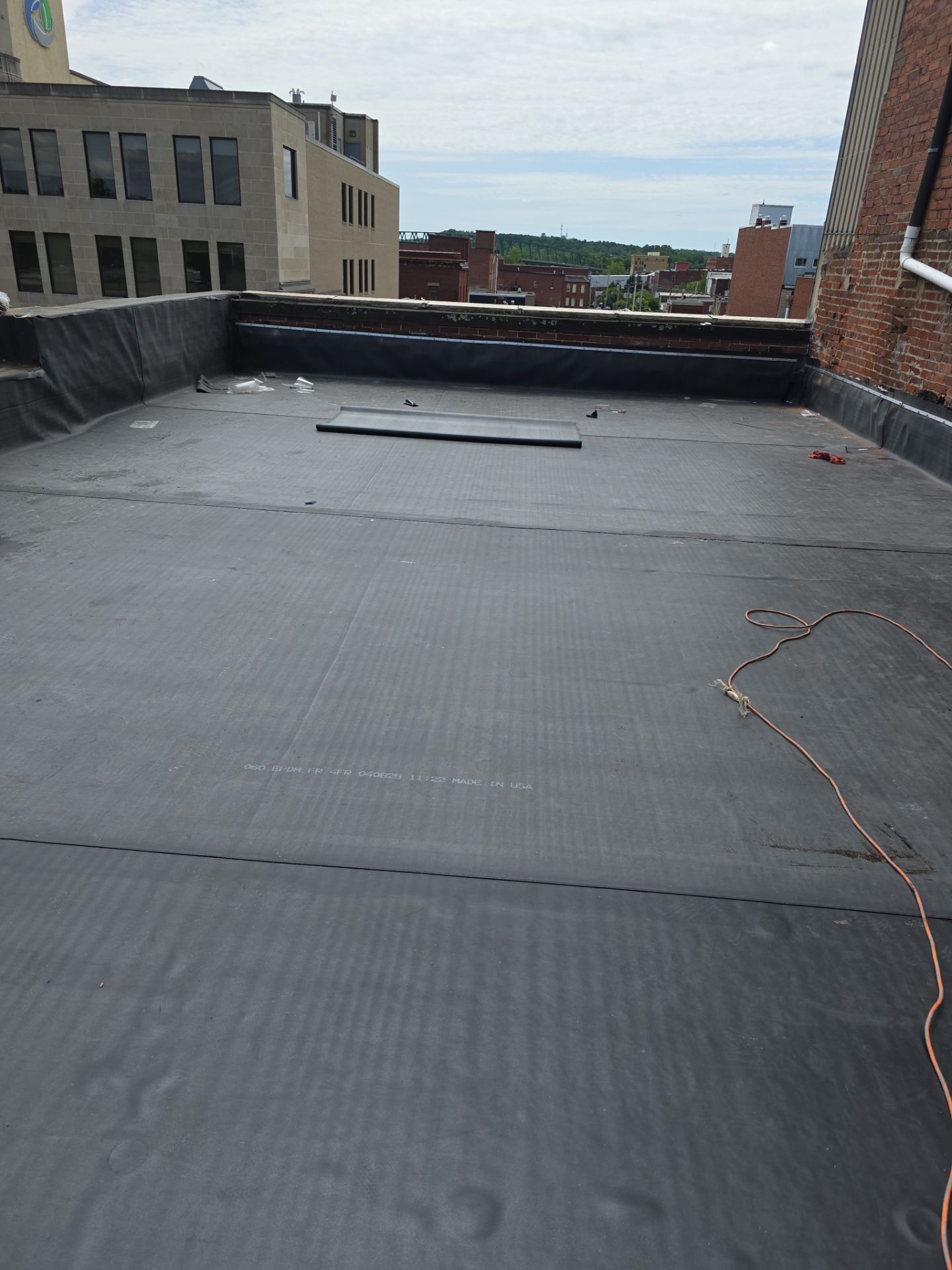 Commercial Roofing Installation using EPDM  by Rainstoppers Roofing