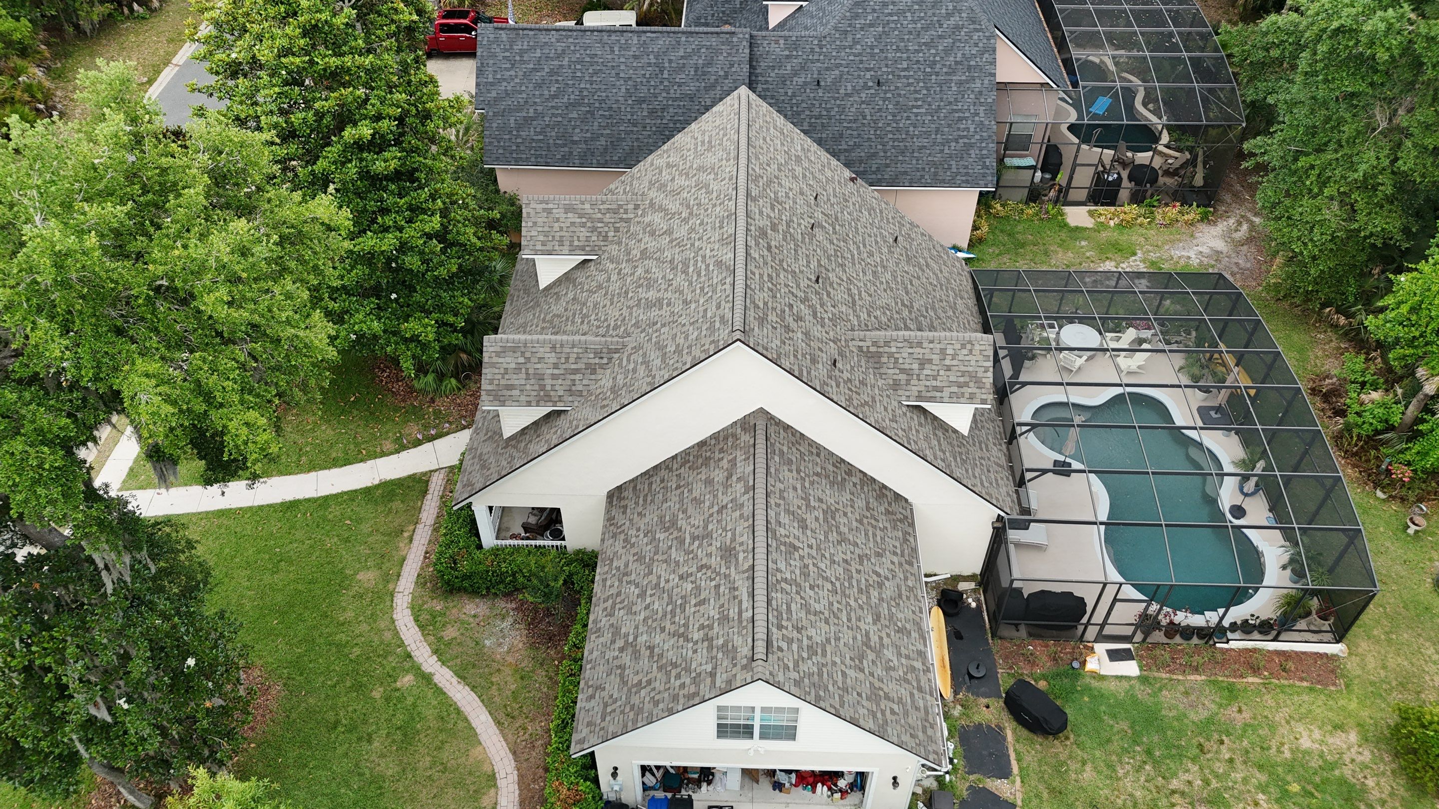 Full Residential Roofing Installation for Multi-Gabled Flagler Beach Home by Trinity Restoration and Roofing LLC