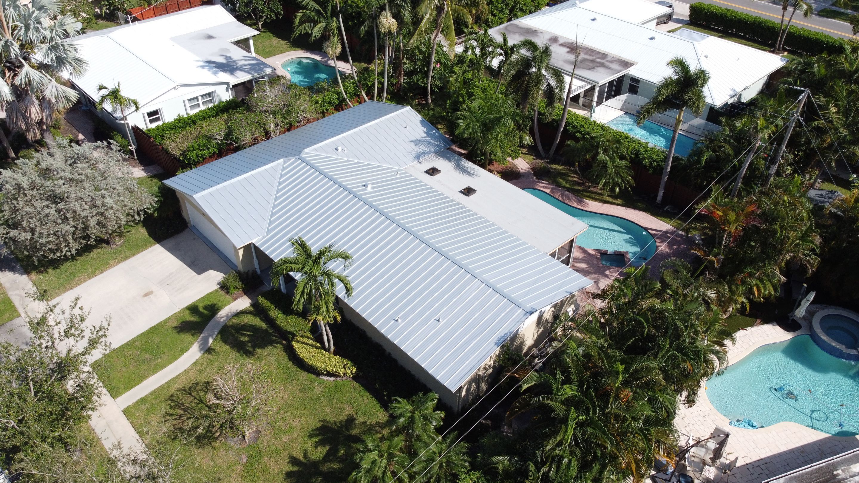 Residential Roofing Installation using 1" Nail strip metal roof by BLUES BROTHERS CONSTRUCTION CORP