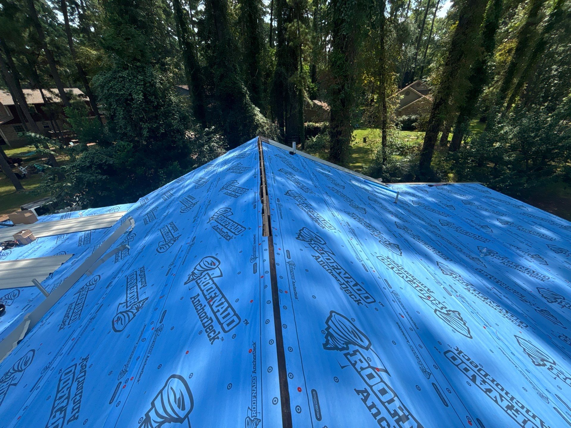 White Standing Seam Metal Roof Replacement in Willis, Texas by Abbott Roofing Company