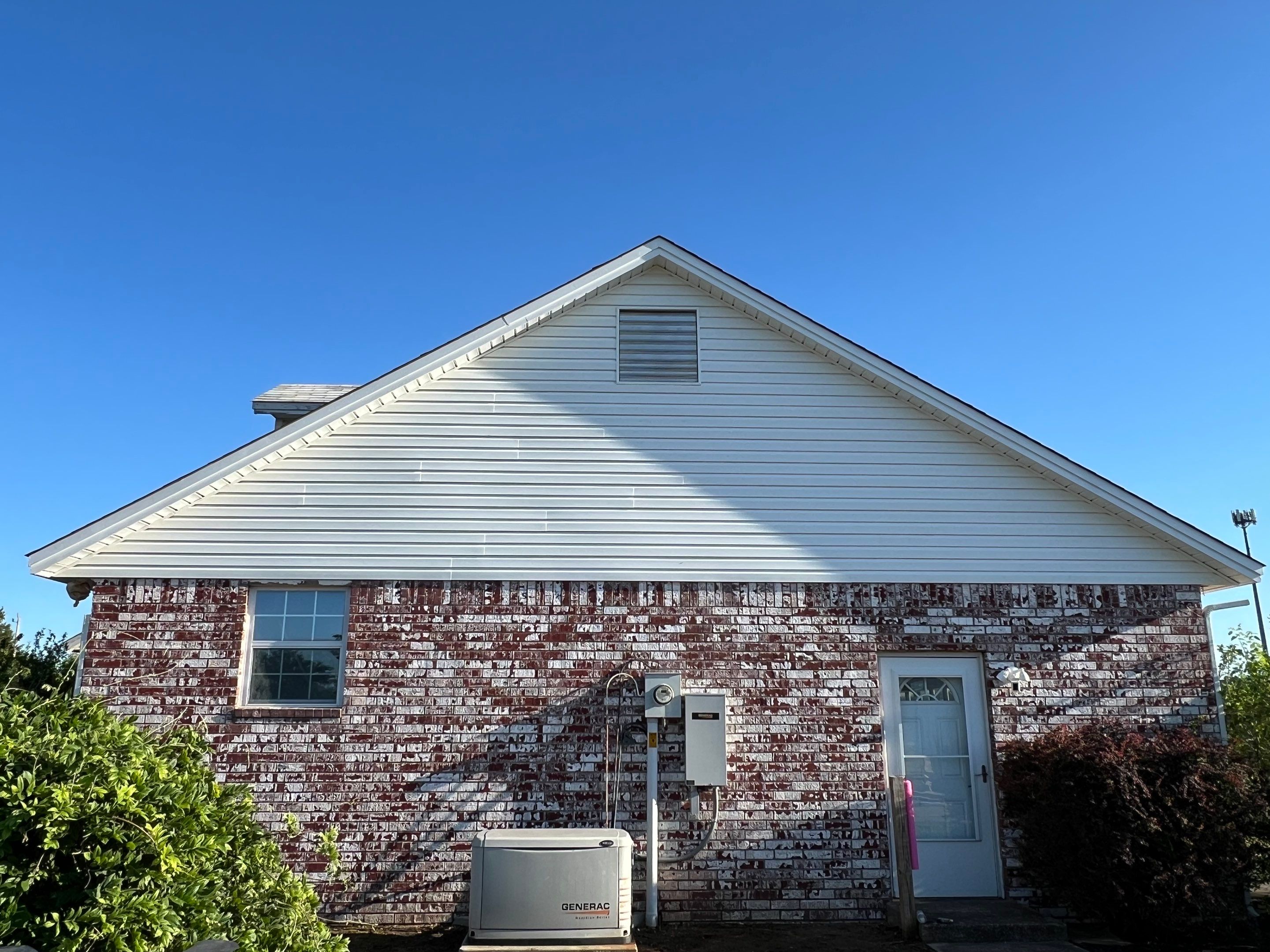 siding and porch railing replacement  in Yukon by McCann's Roofing and Construction