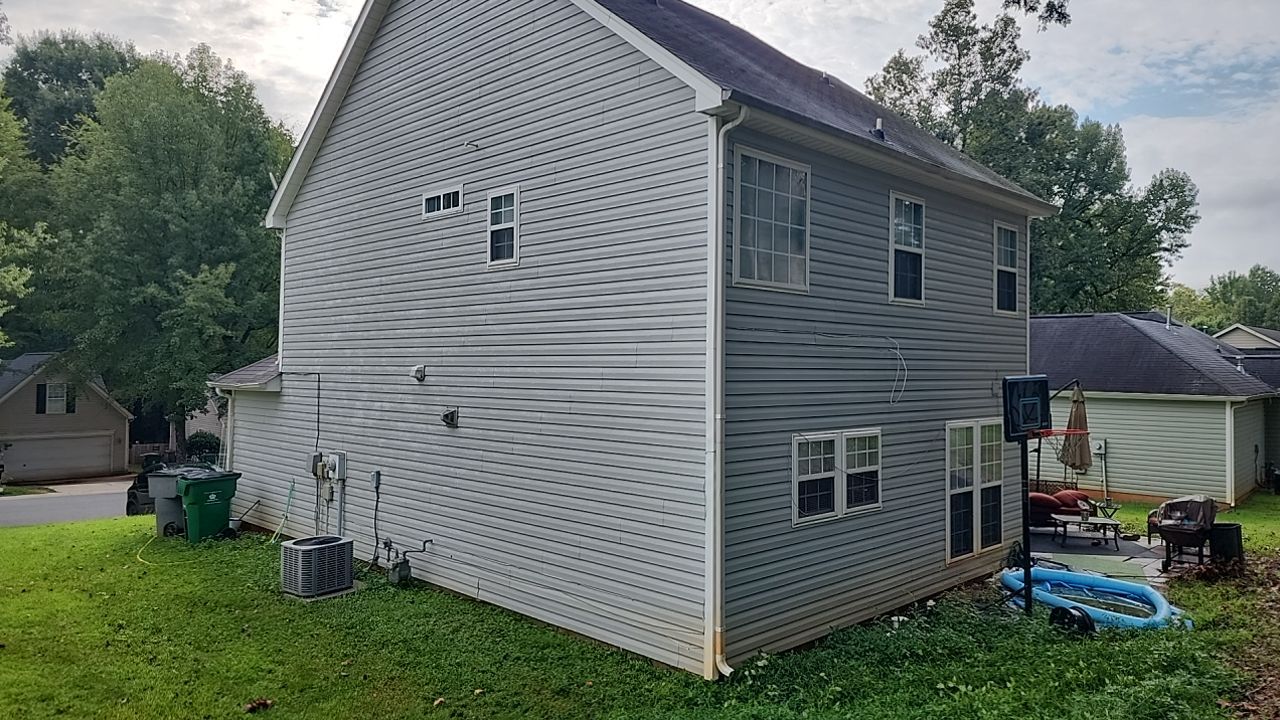 House Wash using cleaner by Power Wash Masters LLC