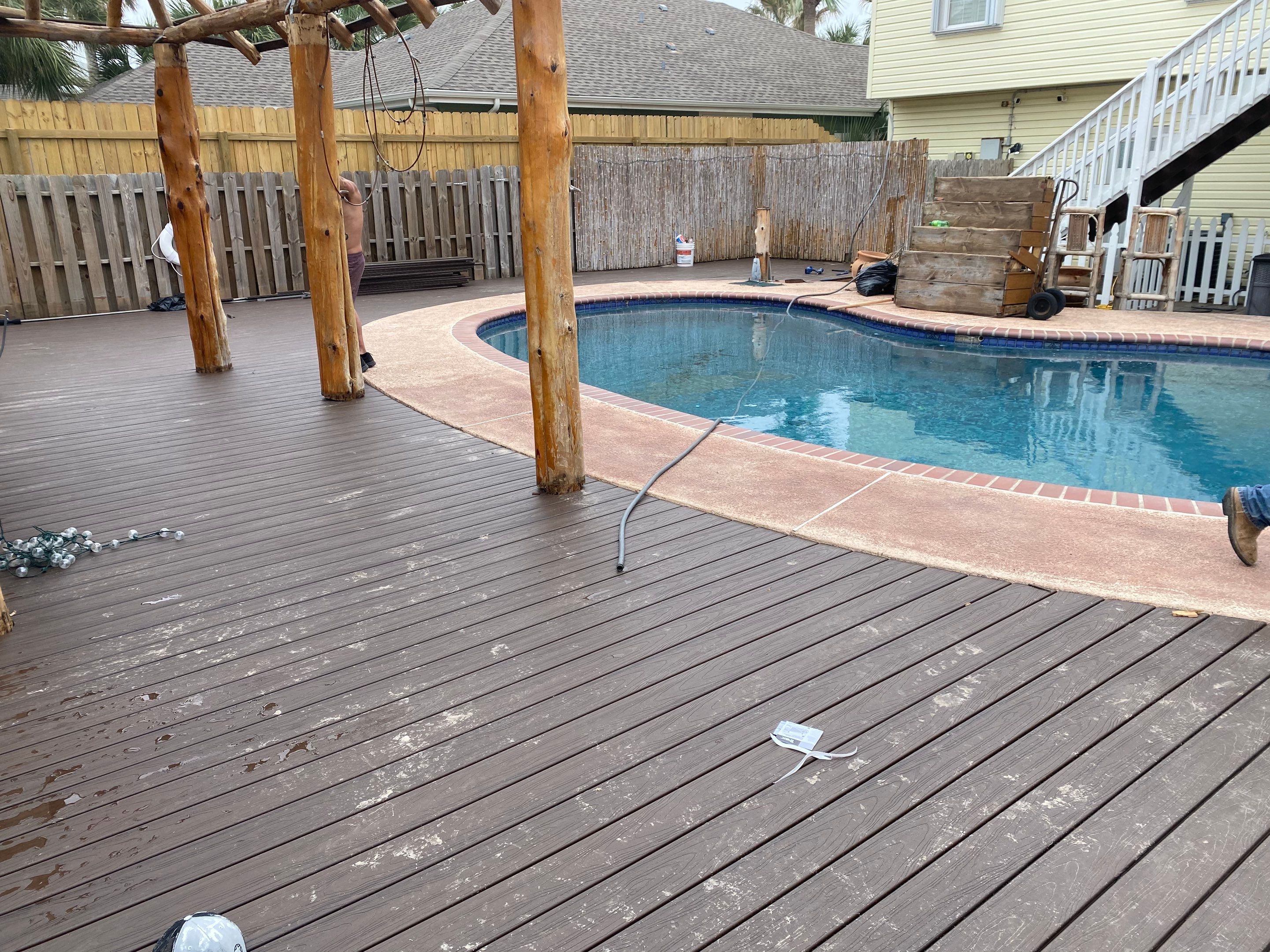 Poolside paradise by Bayfront Roofing and Construction