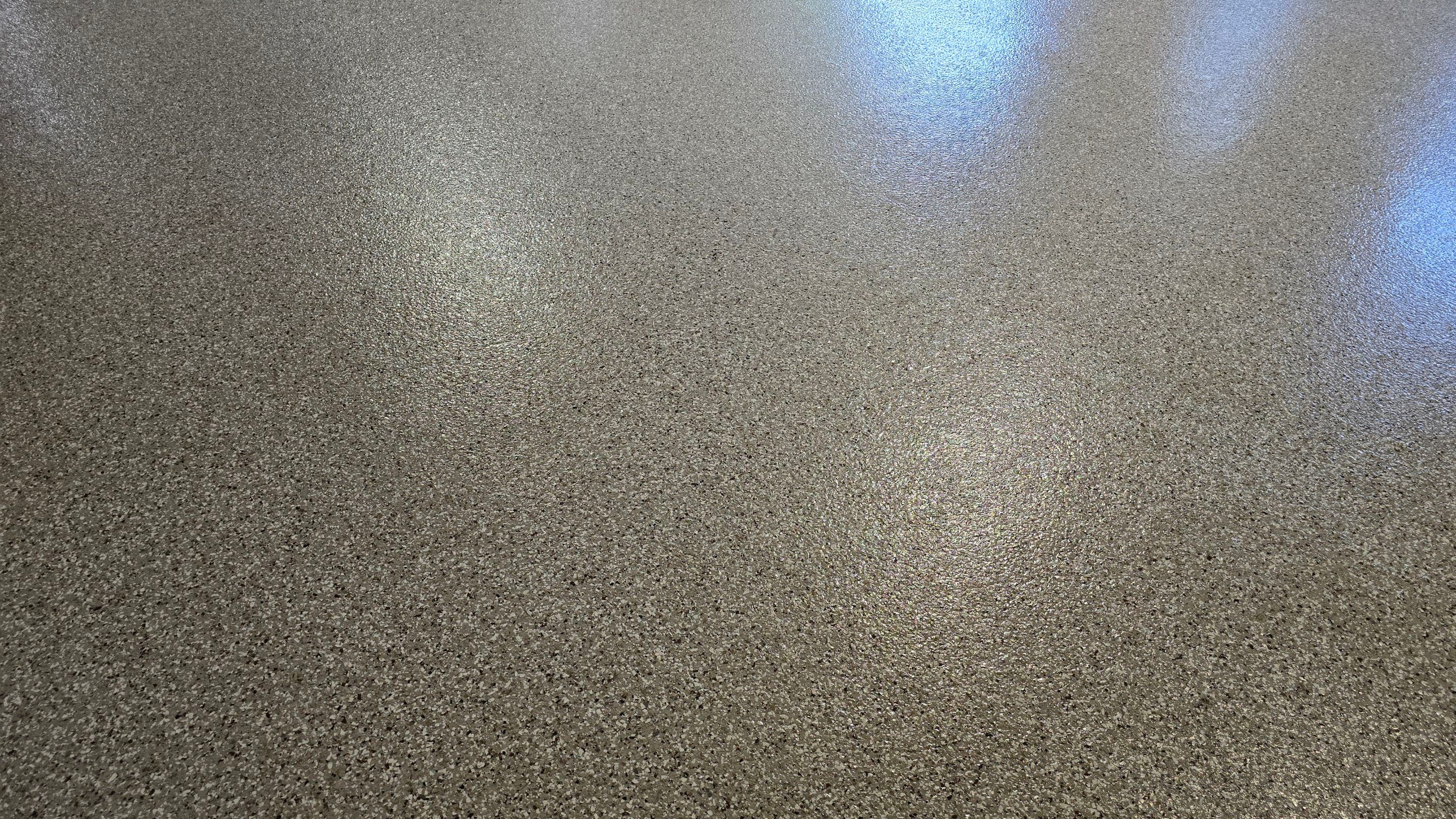Garage & Porch Using Creekbed by Elite Floor Solutions