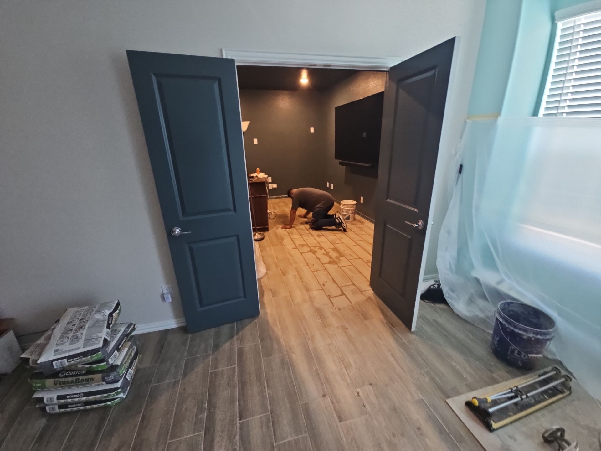 Carpet replacement with Tile and Red Oak Stairs by EL-GC LLC 