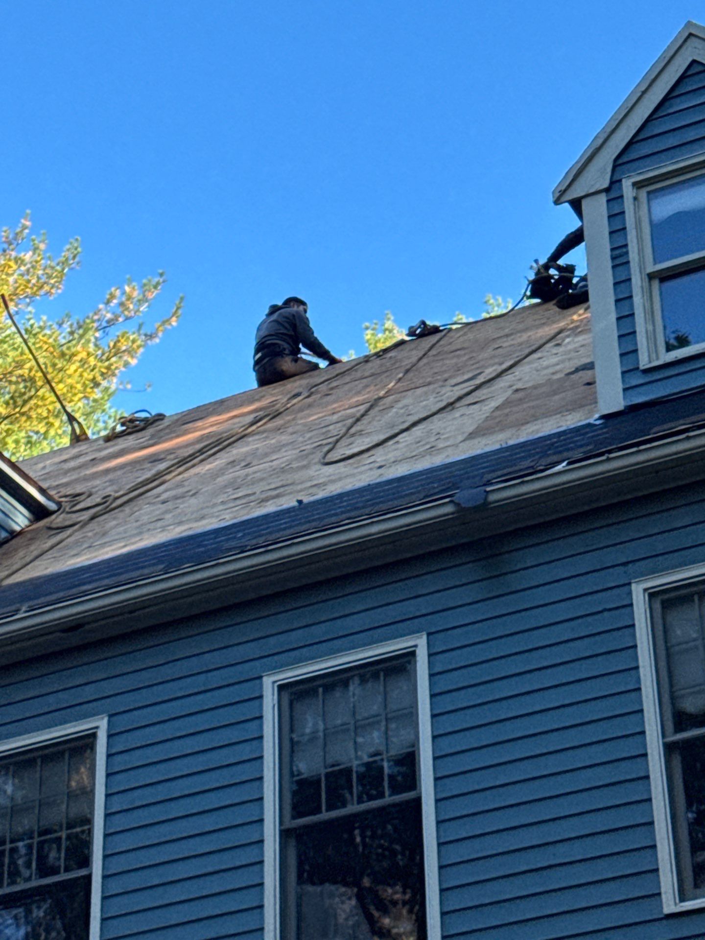 Milford Complete Roof Replacement with Velux Skylight Upgrade by Mighty Dog Roofing of Greater Middlesex County