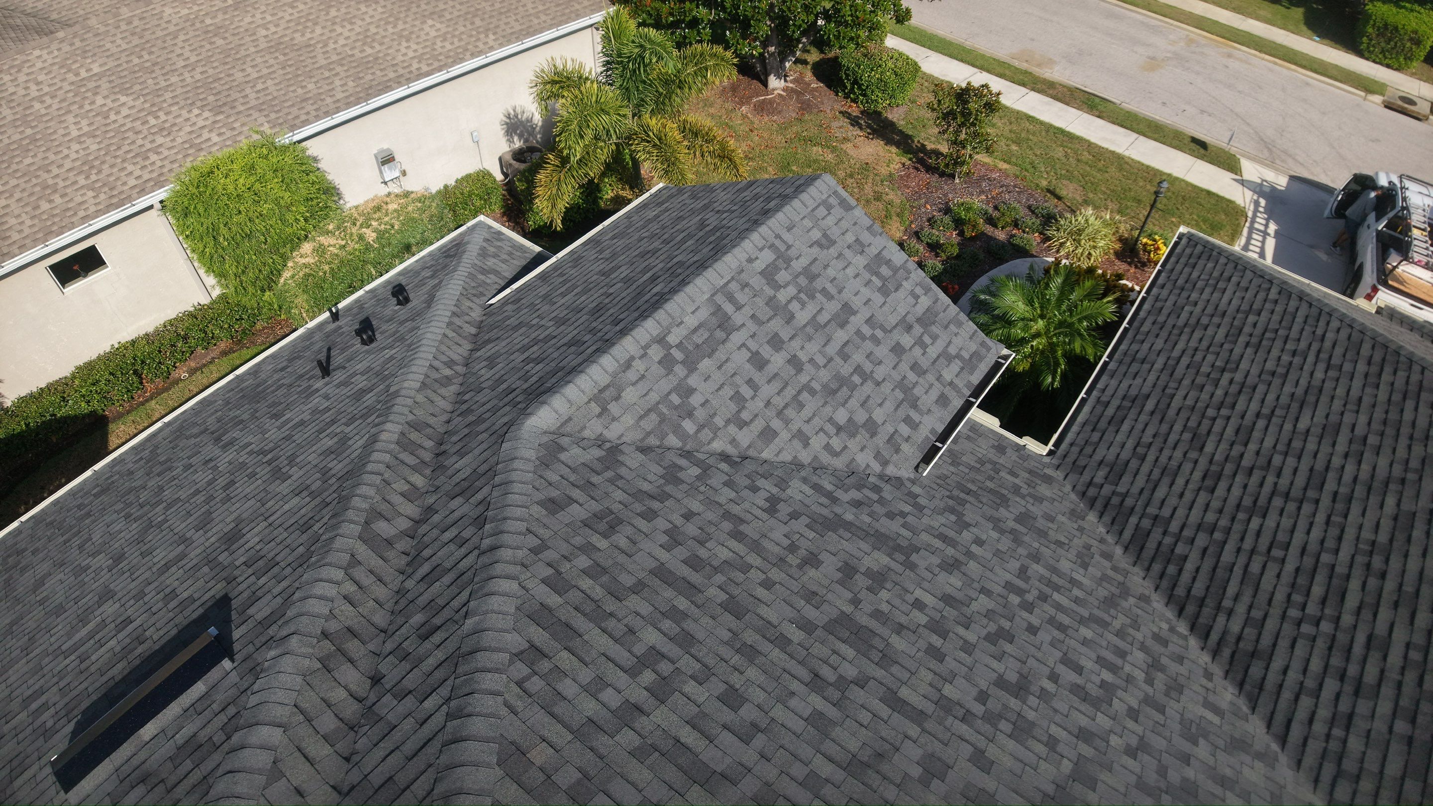 Residential Roof Installation With Estate Grey Architectural Shingles in Bradenton by Trinity Restoration and Roofing LLC
