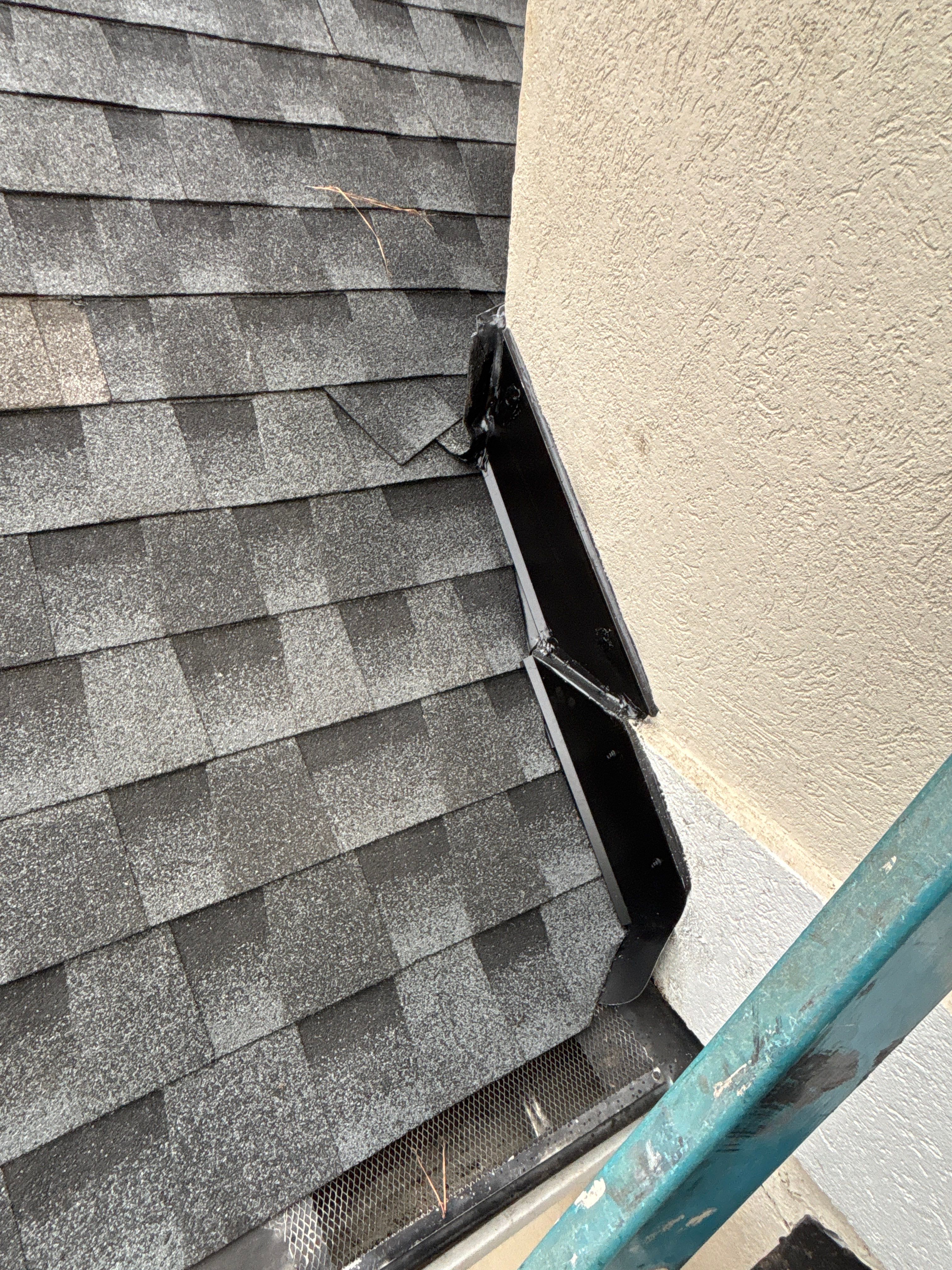 Wrong V valley section installed  by Deerfield Roofing LLC