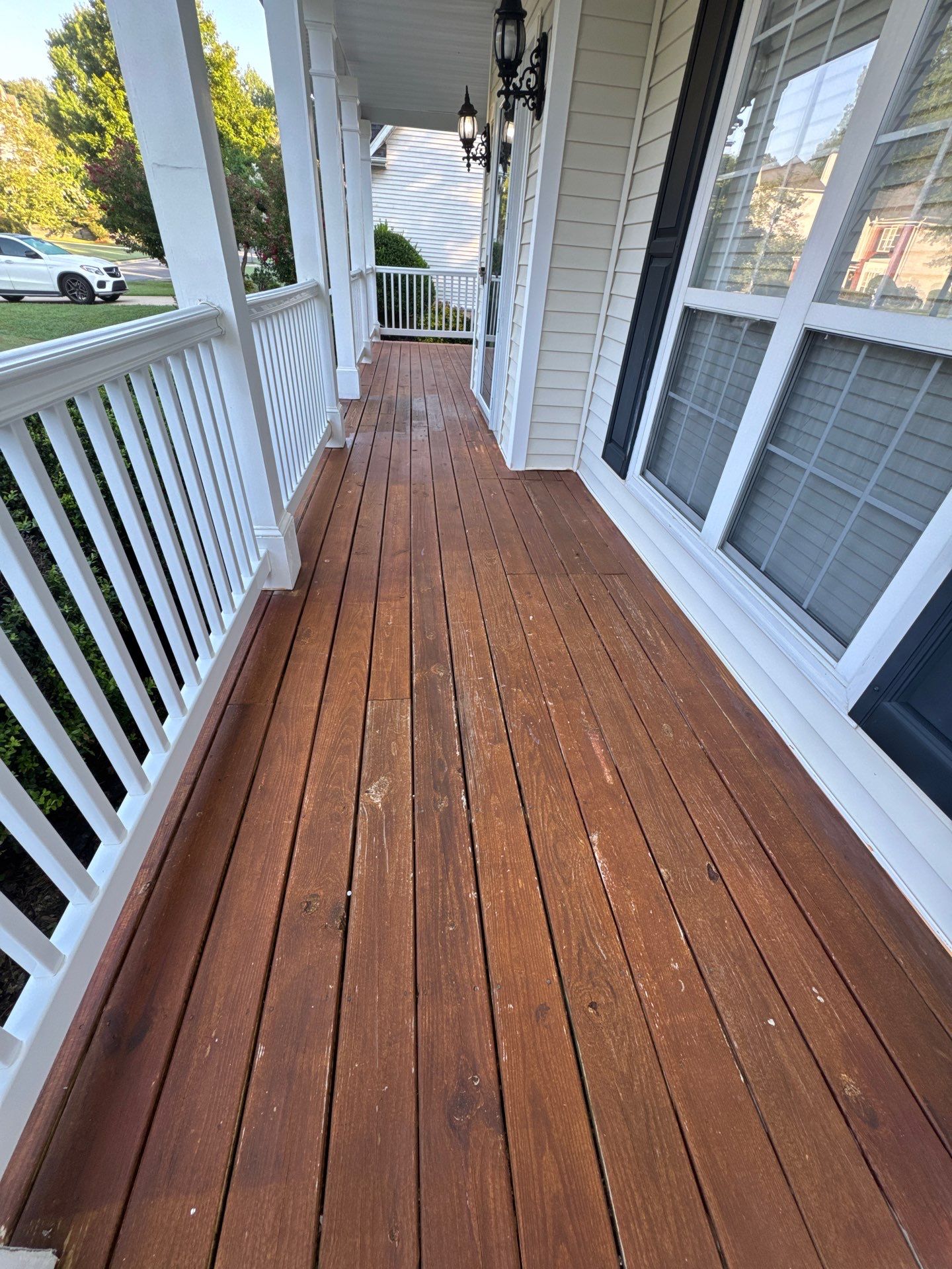 Multi-Level Deck and Front Porch Staining in Powder Springs by Swift Home Renovations