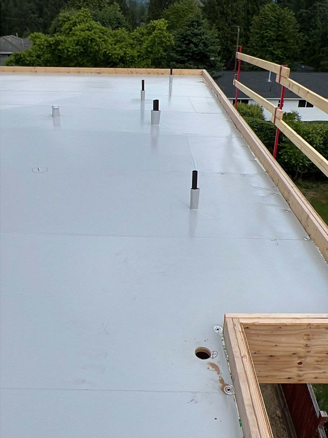 Residential Roofing Installation using Durolast roofing membrane by Top Notch Roofing Inc