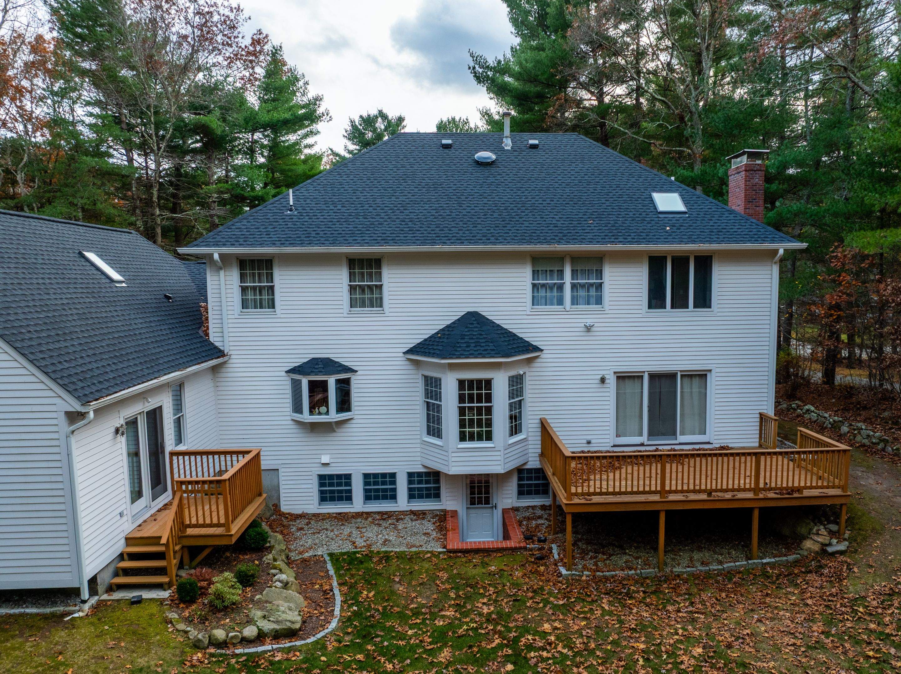 High Hawk - Architectural Shingles, Copper Brick Flashing, Skylights by Rinaldi Brothers
