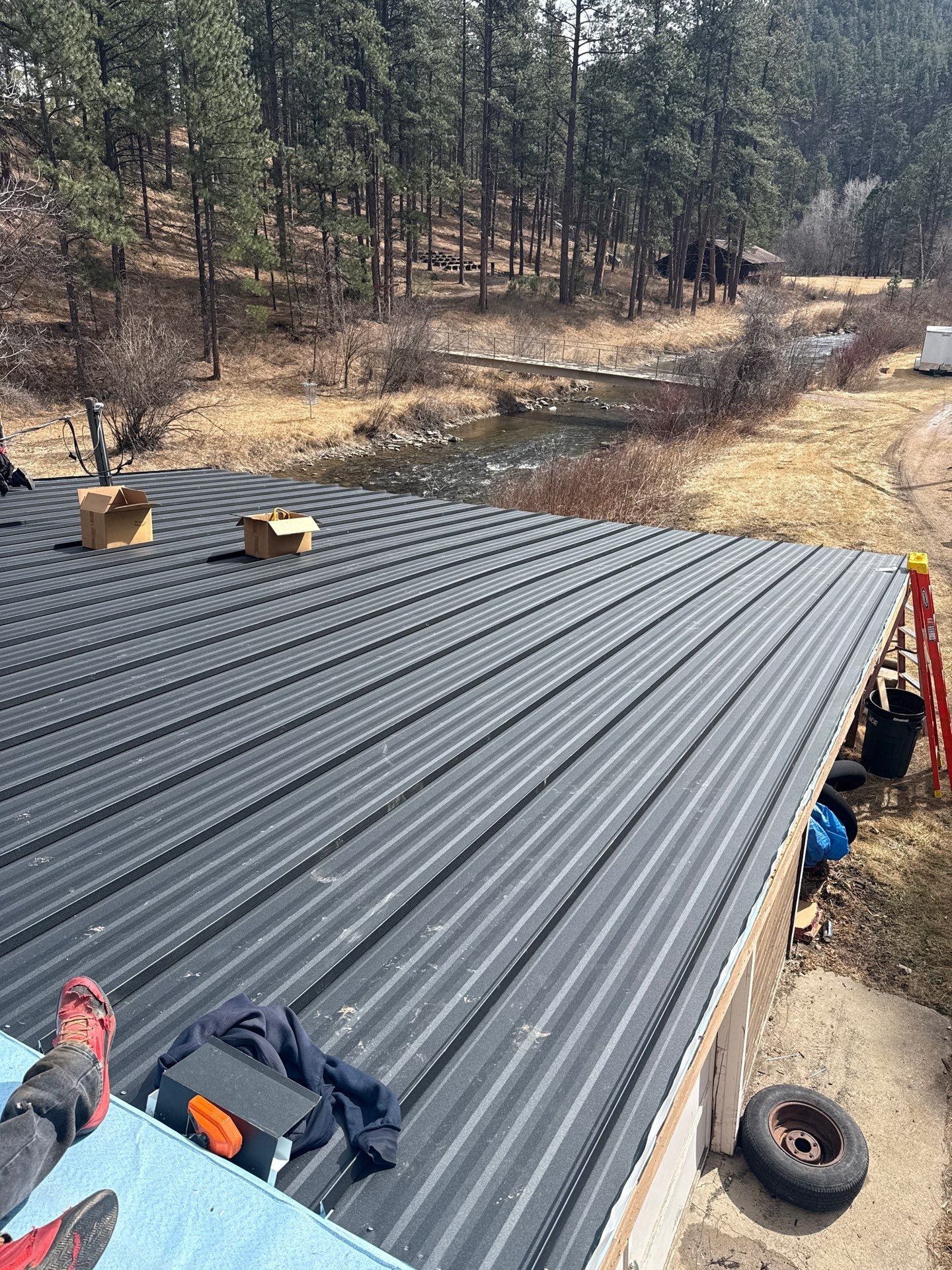 Residential Roofing Installation using Steel Roofing by Weather-Tite Exteriors LLC