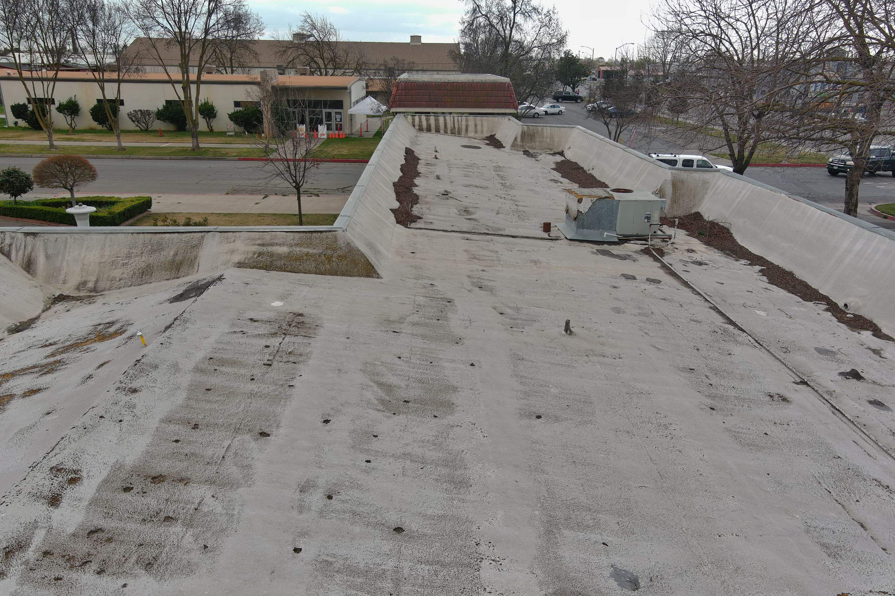 Commercial Roofing Installation using General Coatings acrylic coatings and spray foam by Straight Edge Roofing Inc