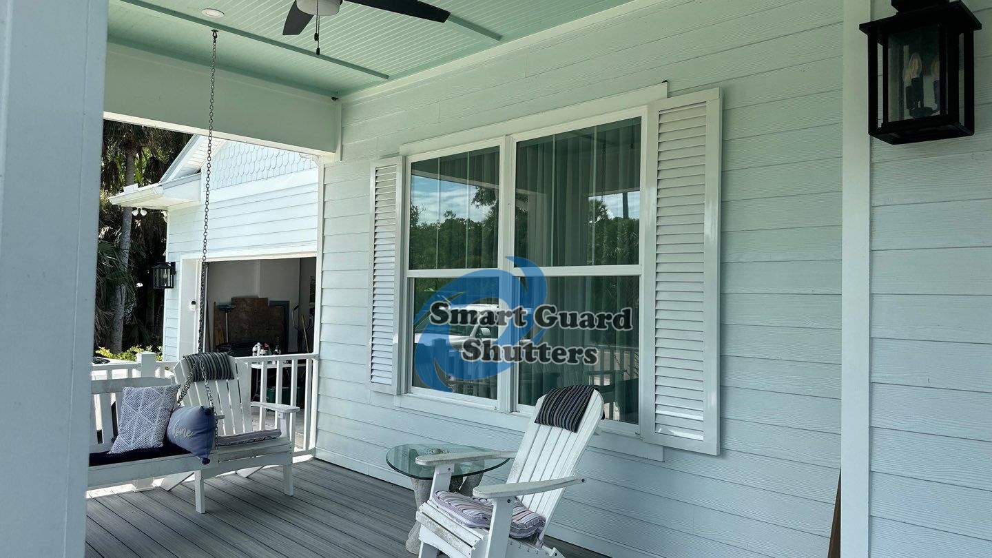 Decorative Colonials in Signal White by Smart Guard Shutters