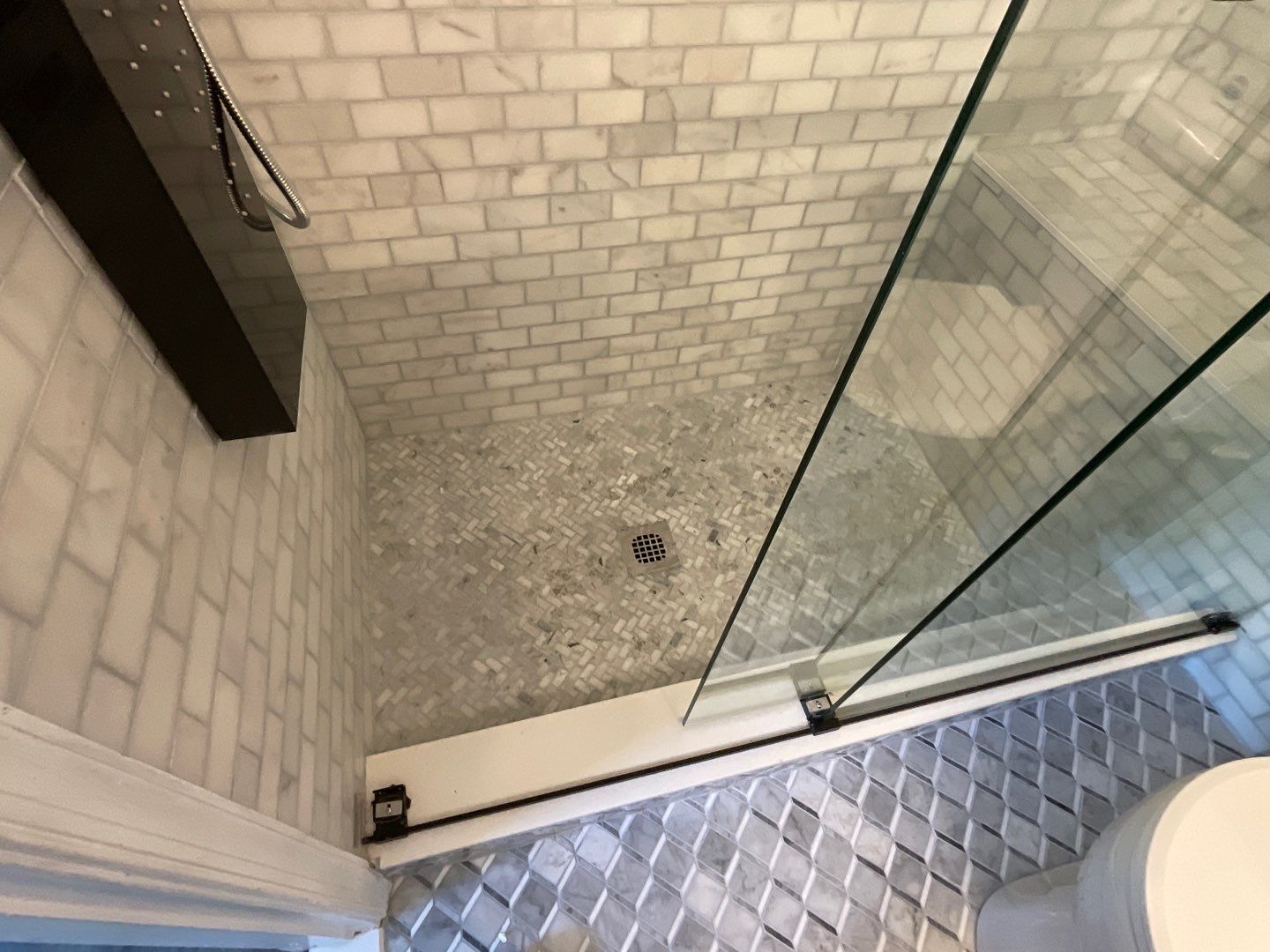 Bathroom Remodel using Two new bathroom design and new floors by Alpha Design Services
