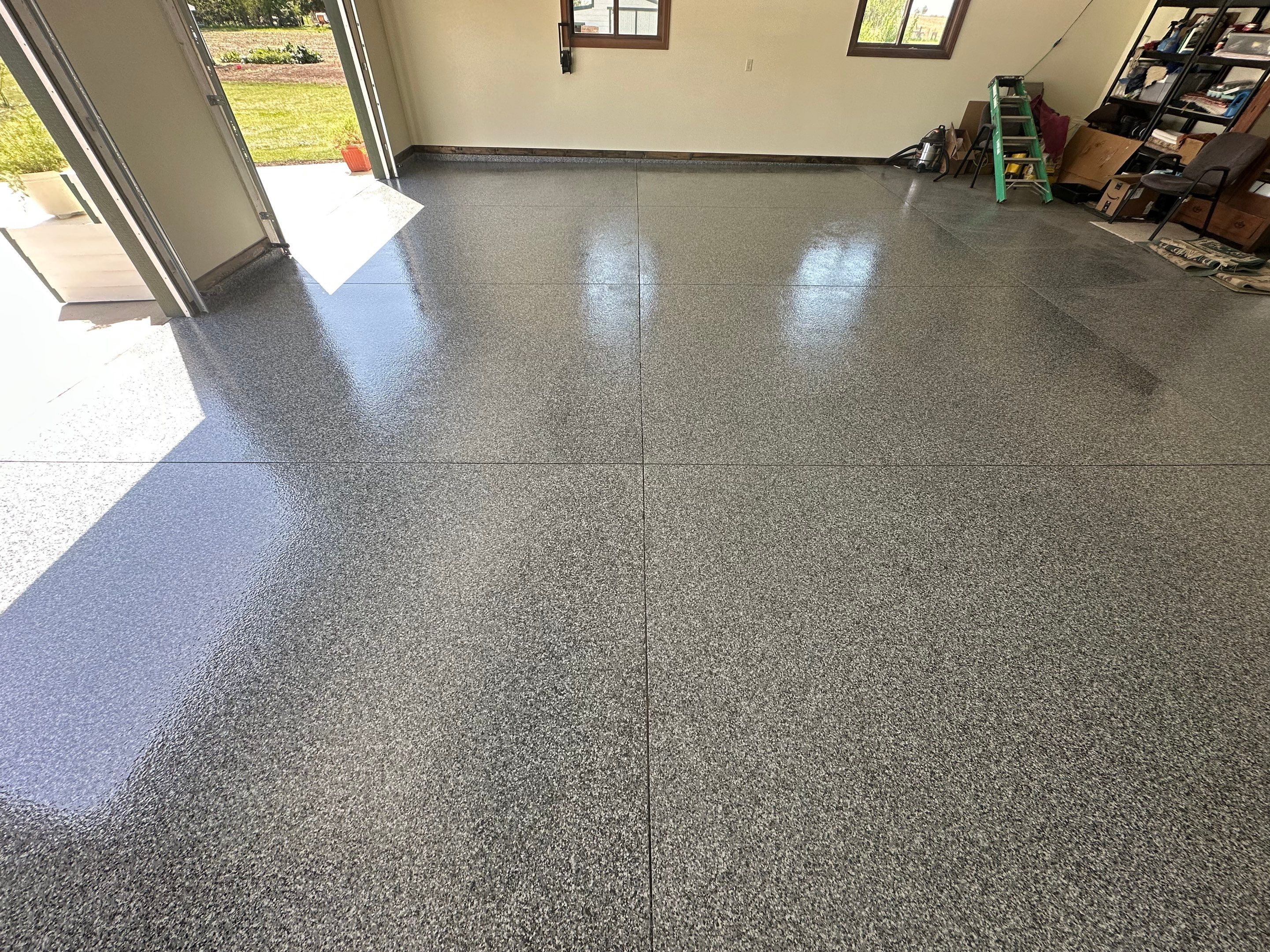 Speckled Epoxy Garage Floor Coating and Concrete Repair in Lennox by Select Painting, Coatings & Garage Cabinets