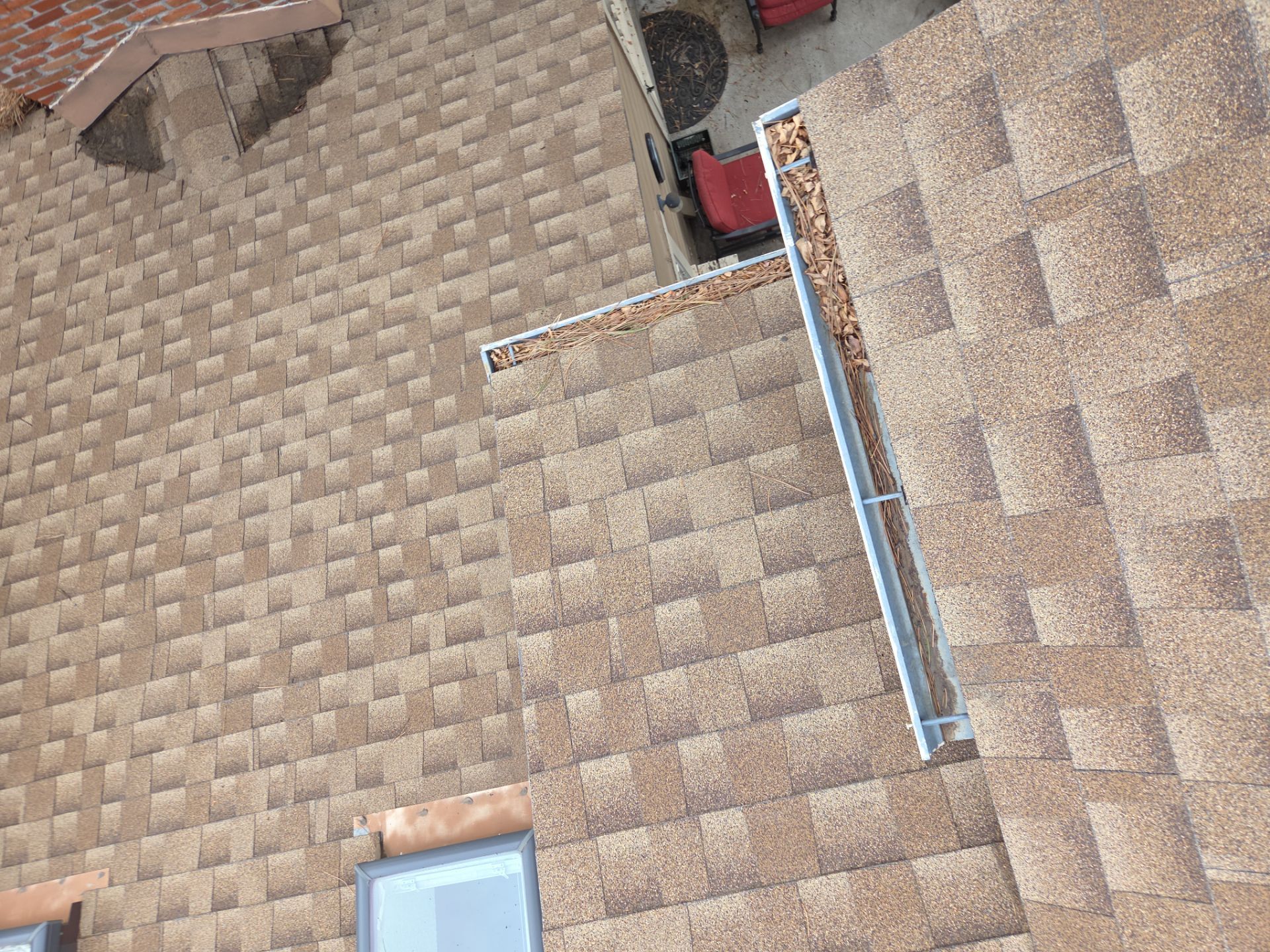 Gutter and Downspout Cleaning by RTP Roofing Company