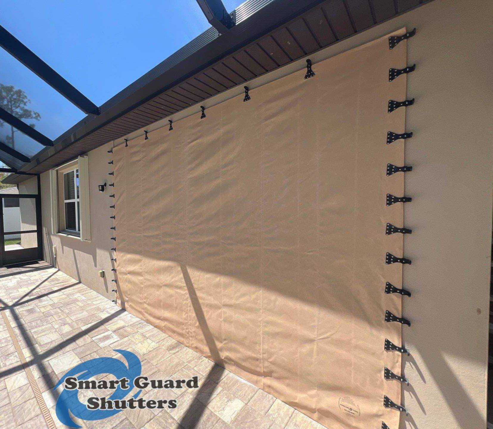 Hurricane Protection in Tan / Ivory by Smart Guard Shutters