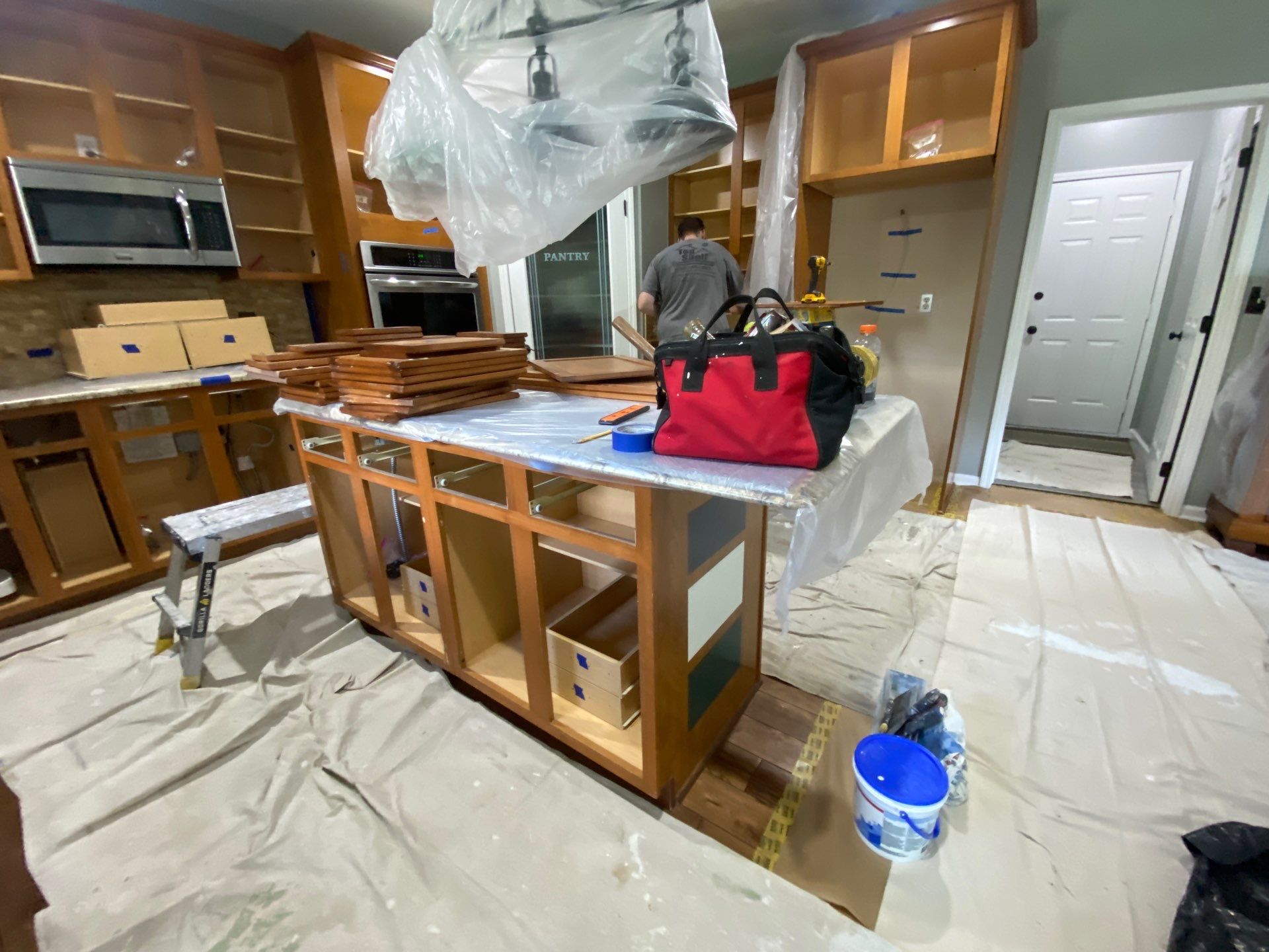 Kitchen Cabinet Refinishing by Top Shelf Painter