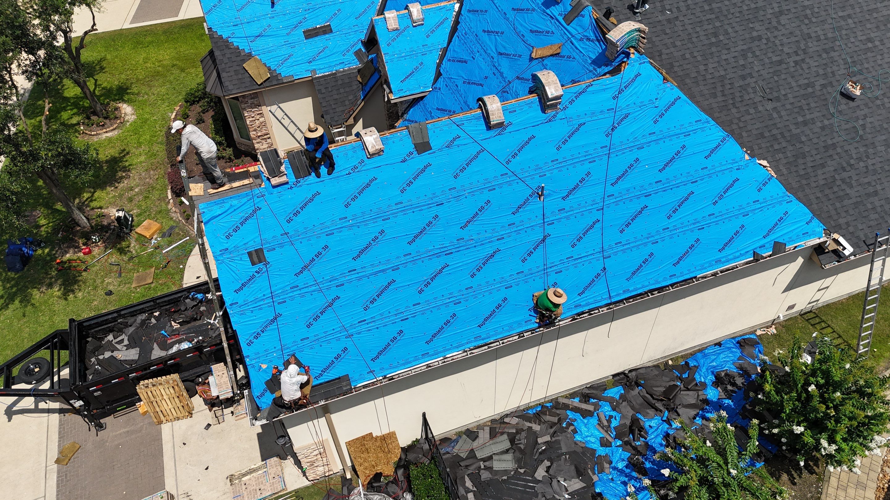 Residential Roofing Installation using Certainteed Landmark after last year's tornado in Cypress by Core Four Roofing