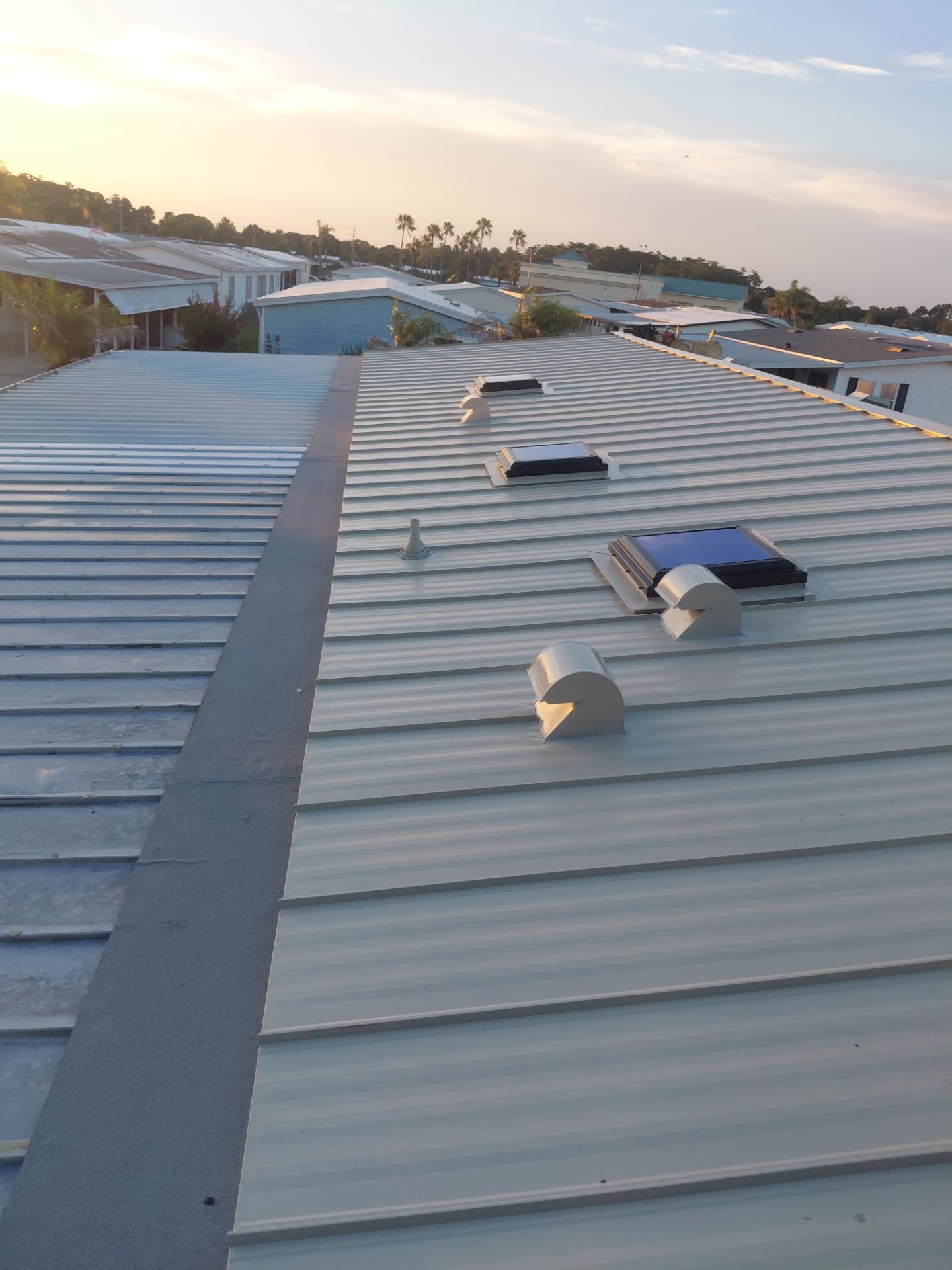 Orlando Residential Standing Seam Metal Roof Installation in Light Stone by Pinnacle Roofing Group