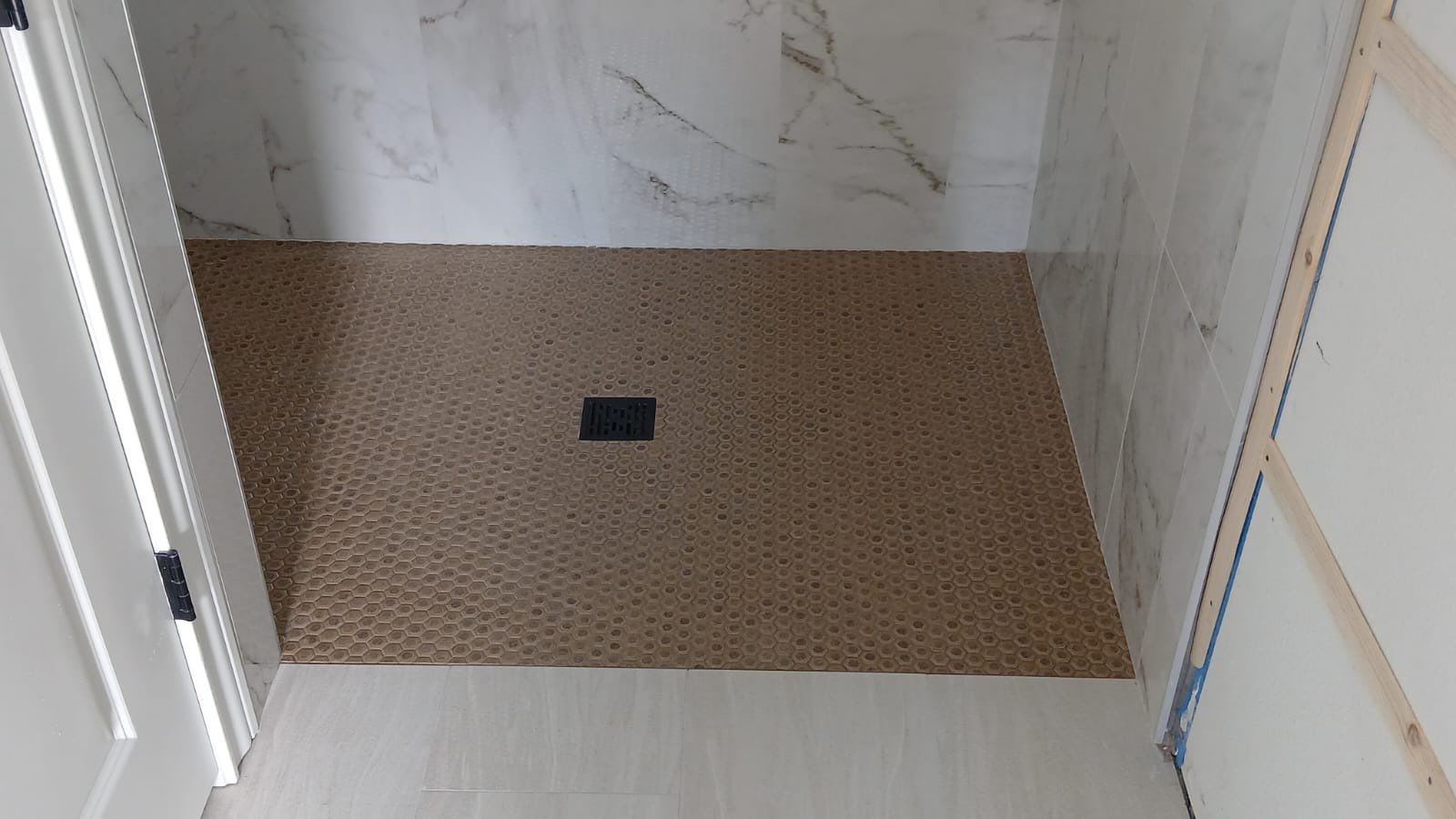 Kitchen and Bathroom Remodel Featuring Custom Stone and Tile in Mico by Mena stone surfaces