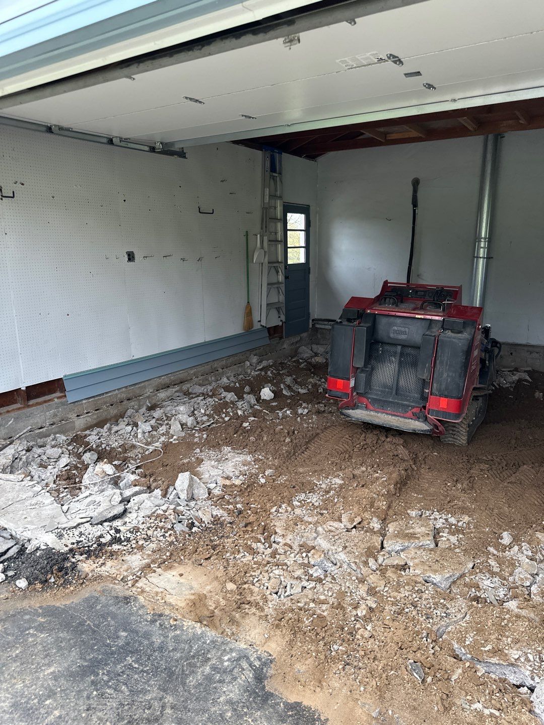 Concrete garage floor replacement by NG Masonry & Construction LLC