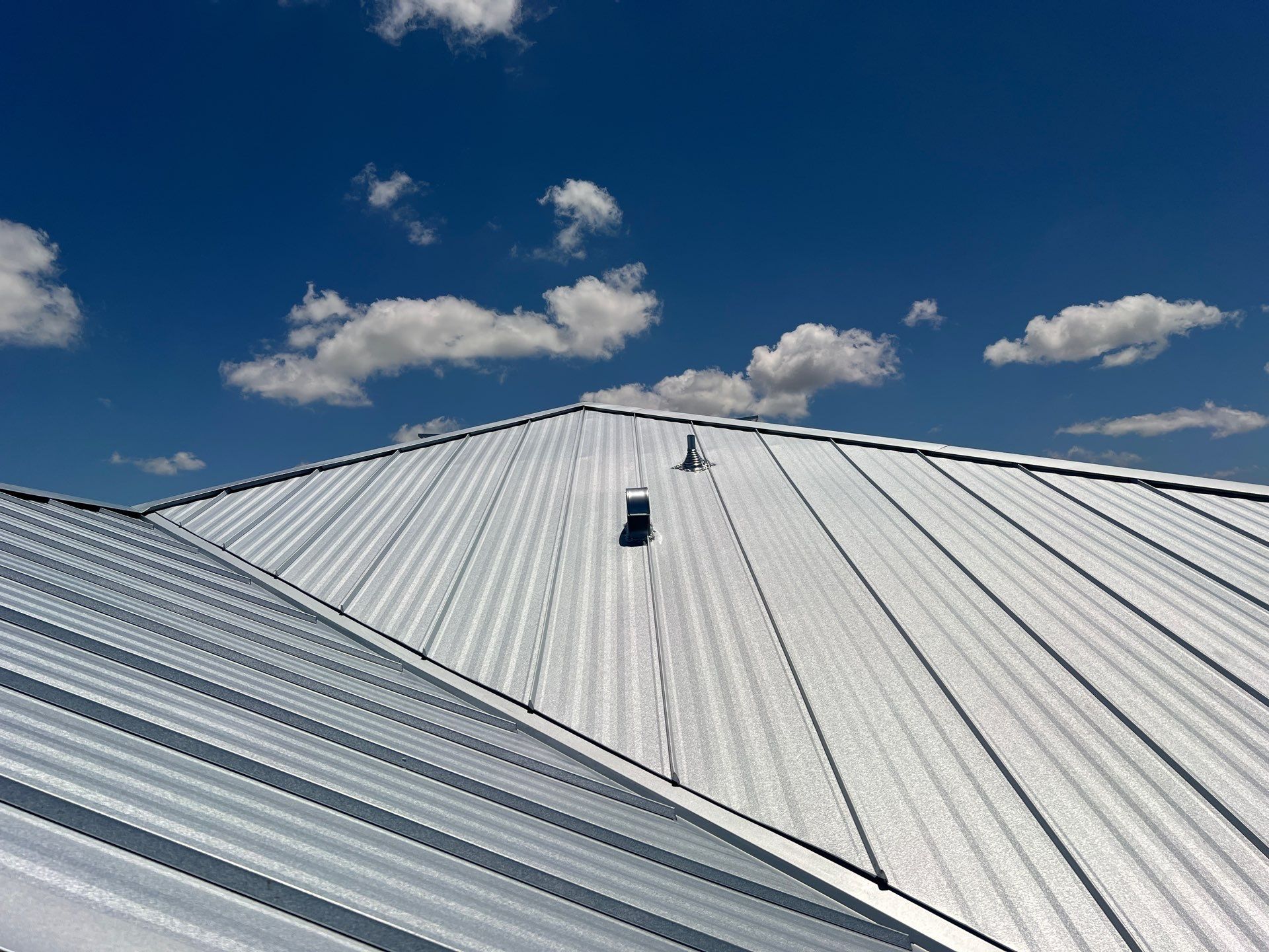 Residential Roofing Installation using Durabull Elite Seam System by Durabilis Roofing INC
