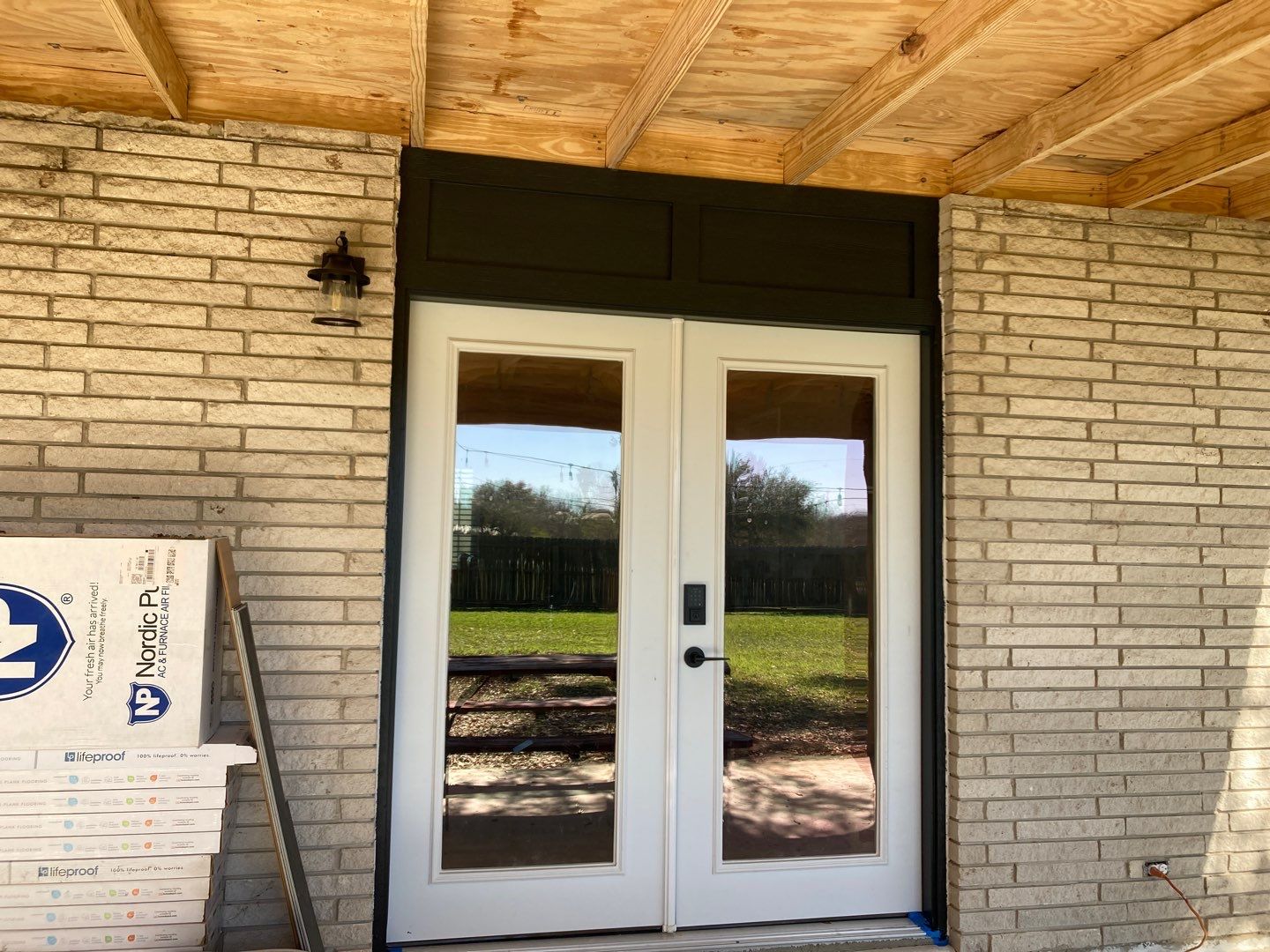 Beeville Backporch sittin' by Bayfront Roofing and Construction