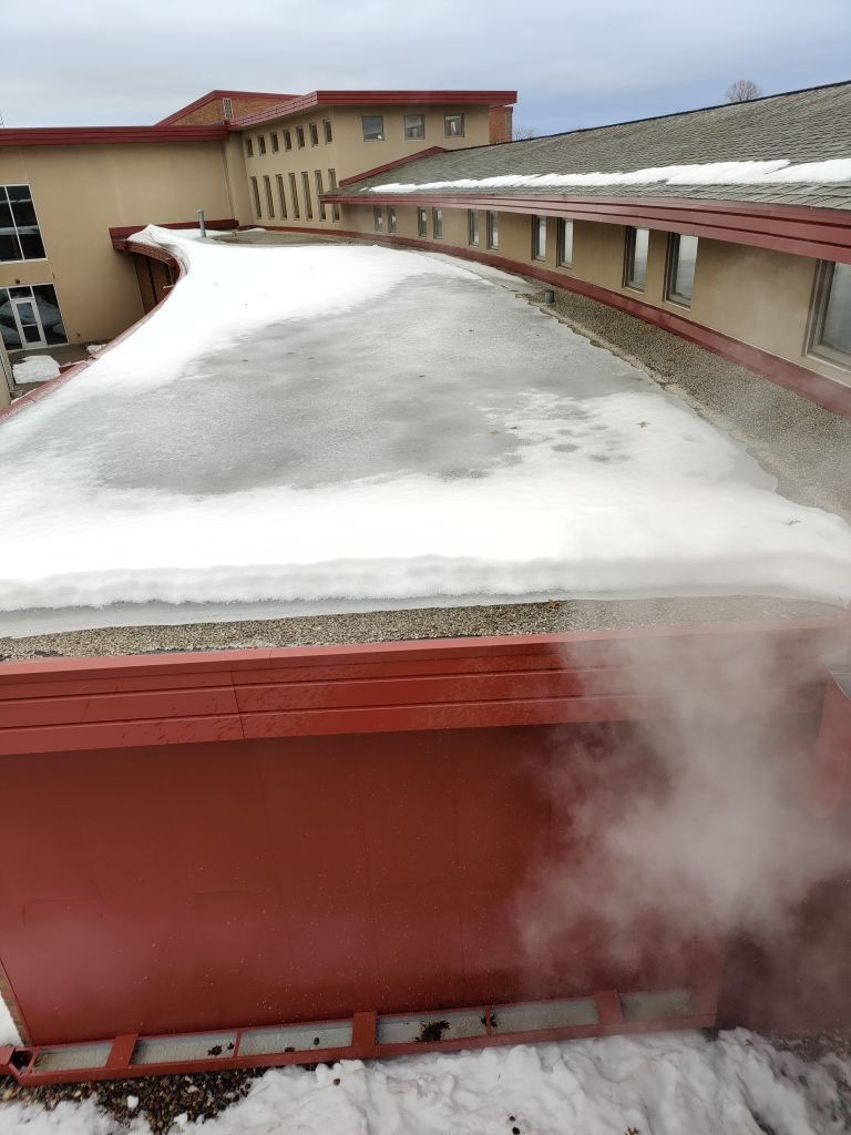 Roof Steaming in Plymouth by Next Level Seamless Gutters / Exteriors Inc.