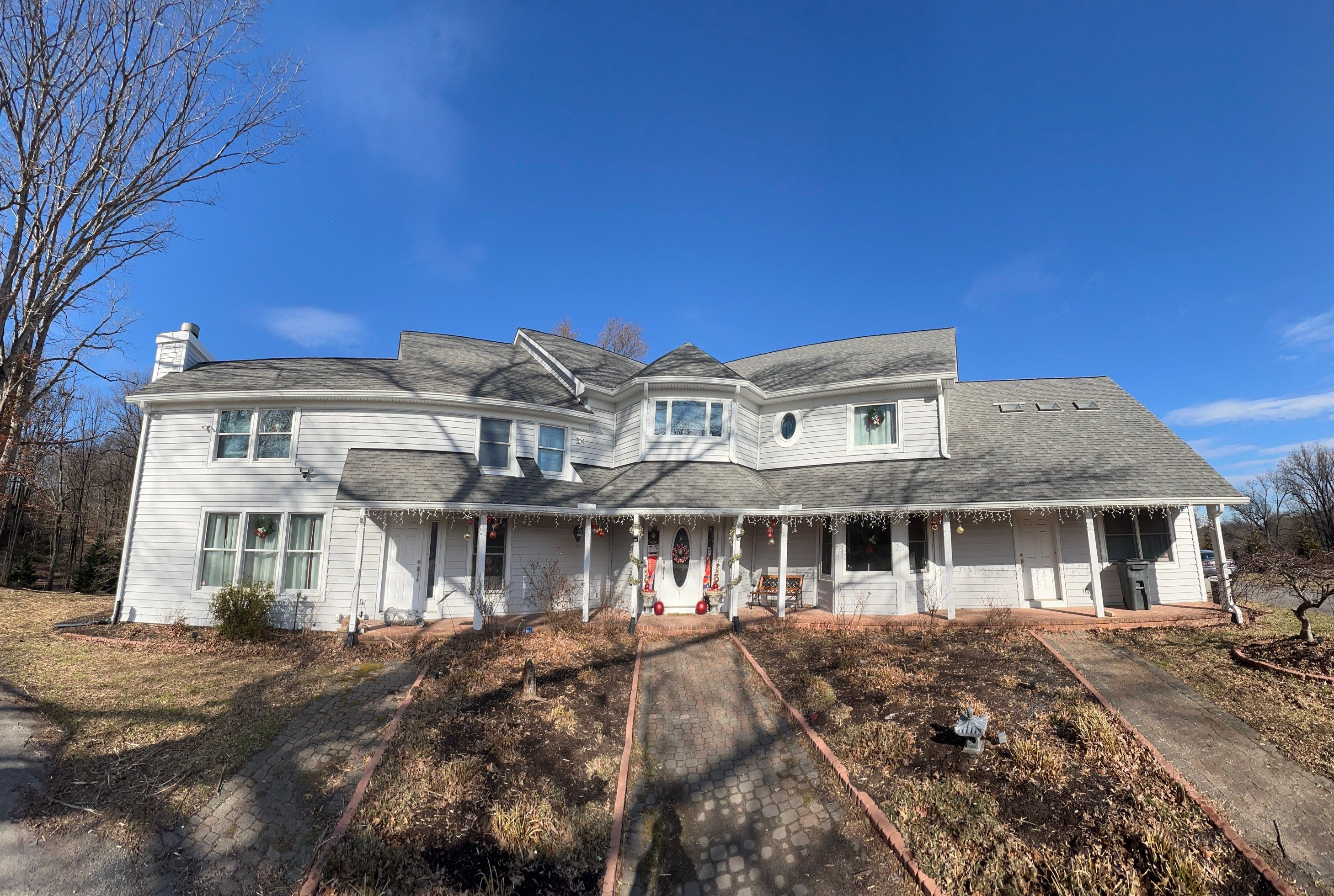 Roof, Gutter, Siding Replacement by American Home Contractors