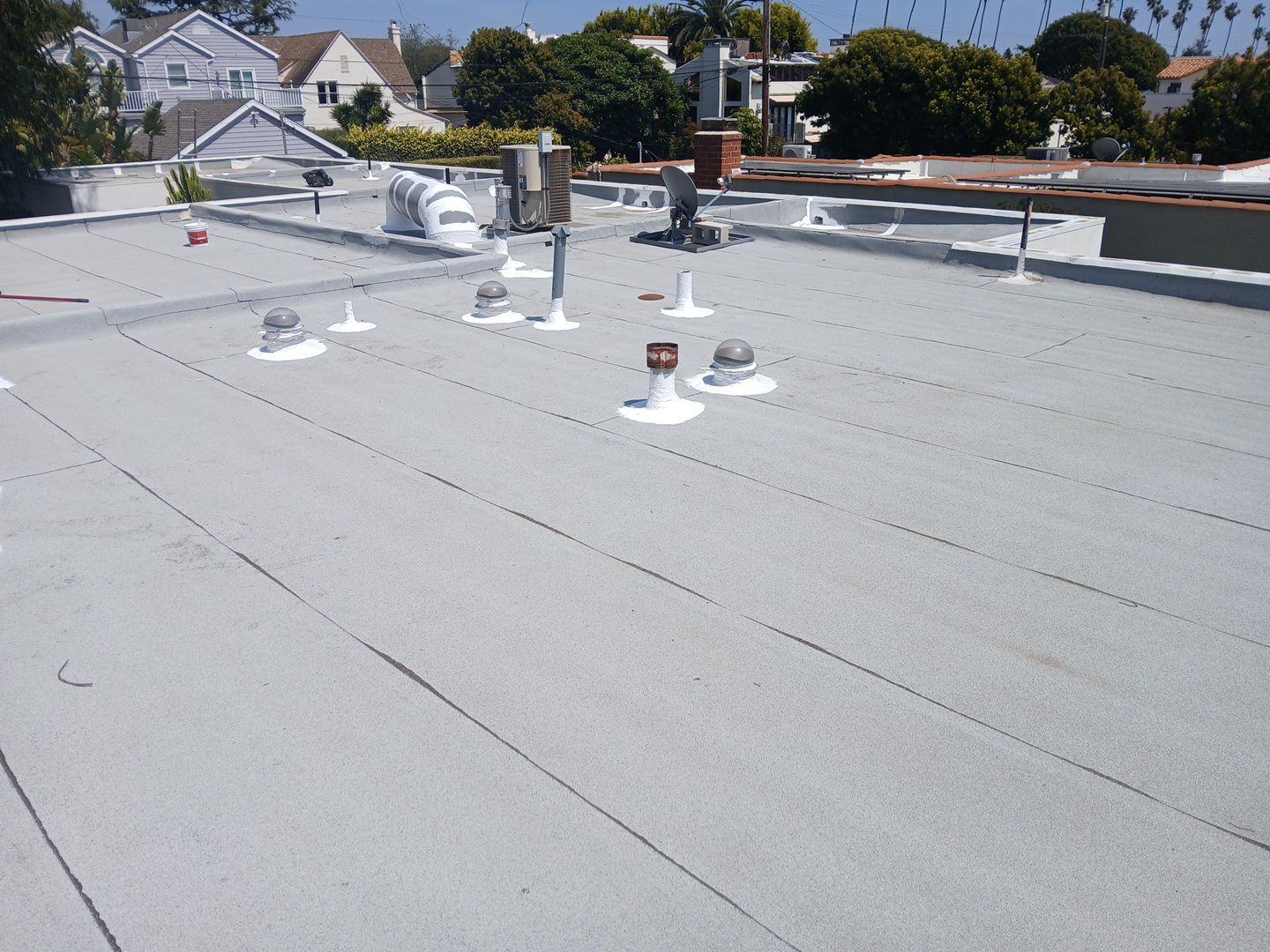 Silicone Membrane Installation using American Standard Coatings Silicone-S by Hull Brothers Roofing