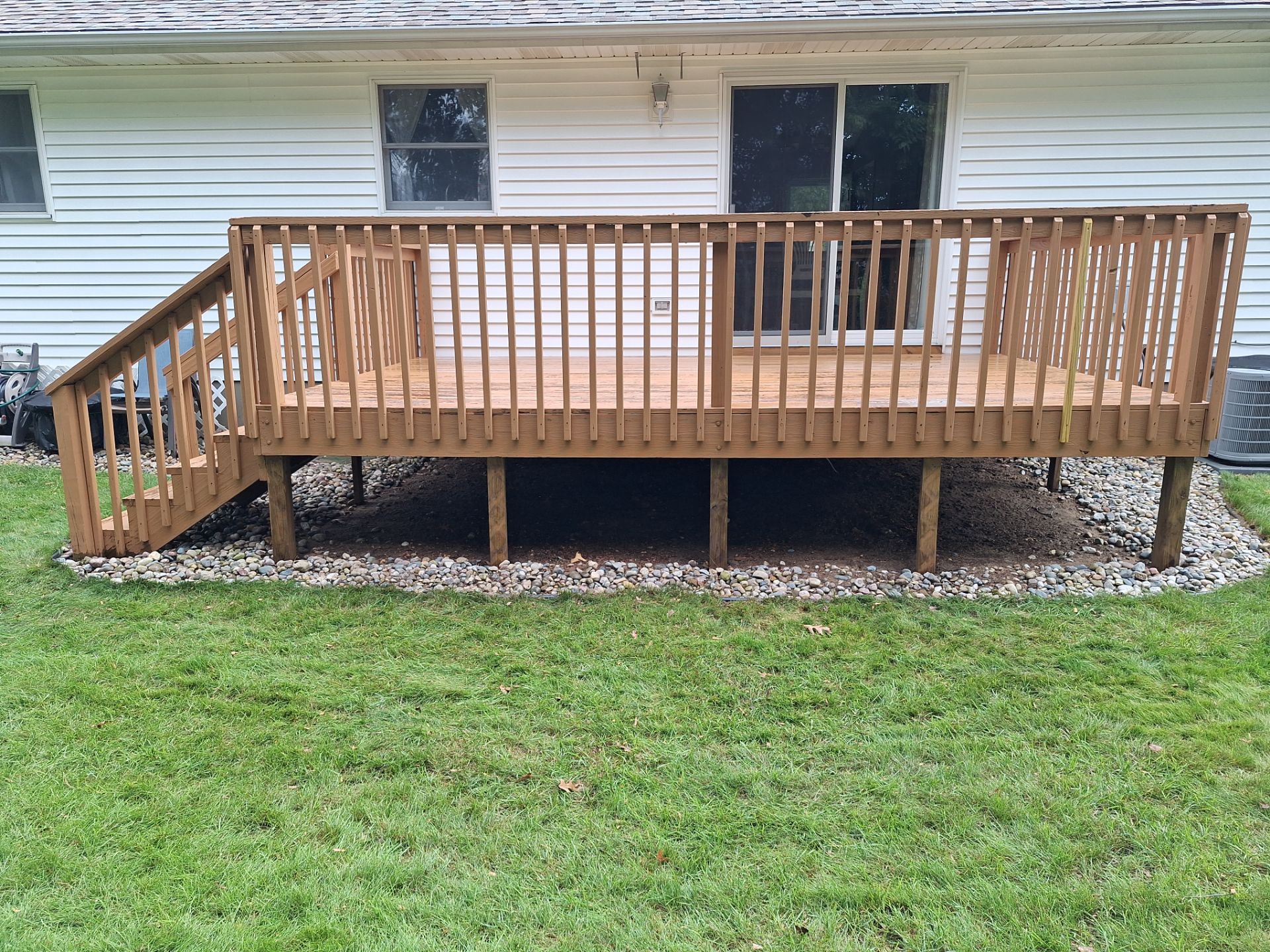 Deck Pressure Washing and Staining in Norton Shores Michigan! by Gordon Painting