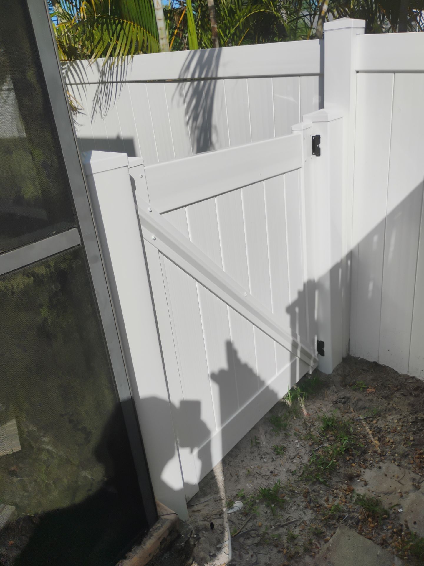 Vinyl Privacy Fence and Double Gate Installation in North Port by True Fence LLC