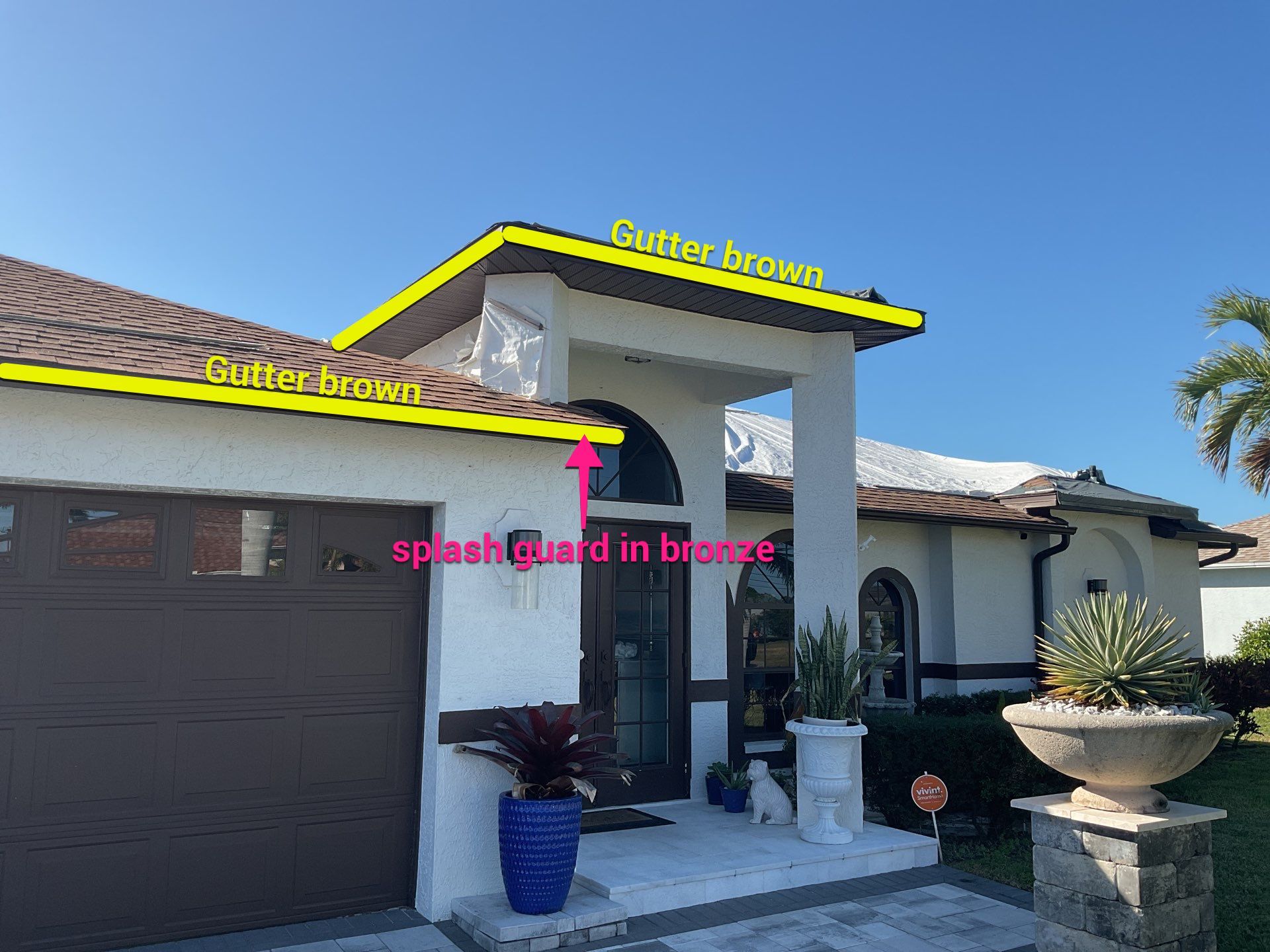 Brown Gutter + White and Brown Downspouts in Cape Coral FL by Gutter Professors