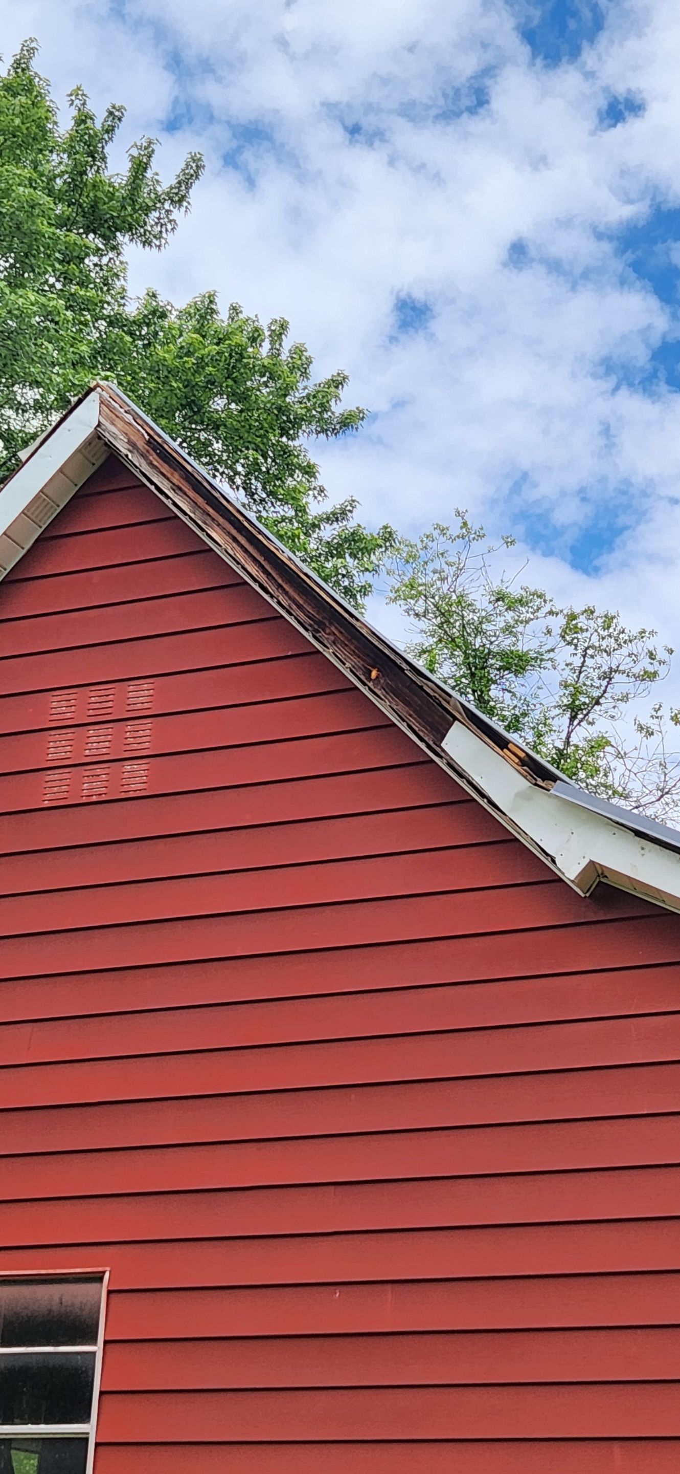 Residential Roofing Installation using 26 Gauge Colored Panels by Hostetler Roofing