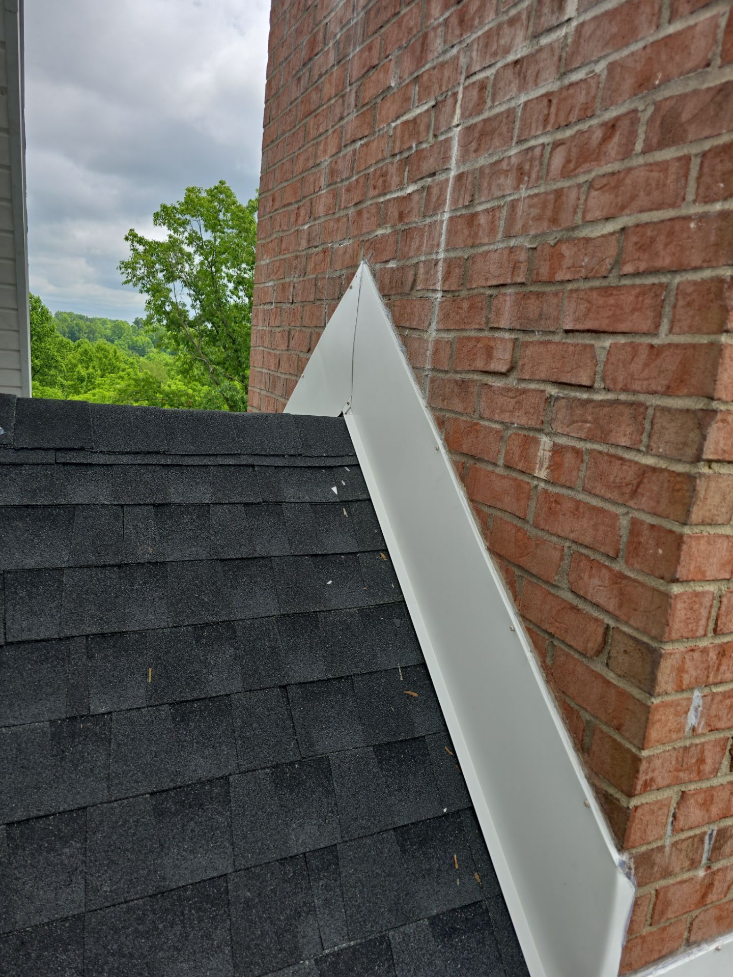 Residential Roofing Installation using GAF Timberline HDZ Charcoal by Rainstoppers Roofing