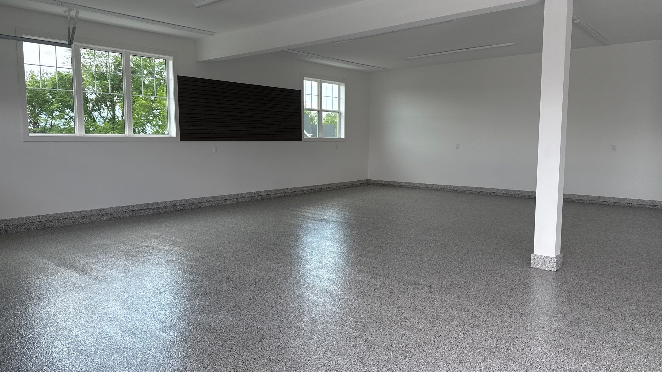 Christopher Has A Beautiful New Floor  by Banner Garage