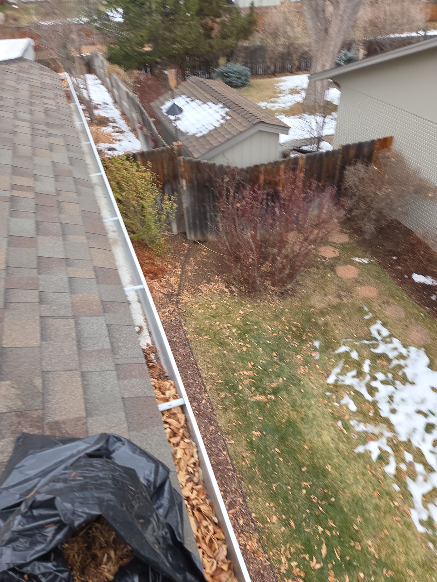   Gutters and Downspout Cleaning by RTP Roofing Company